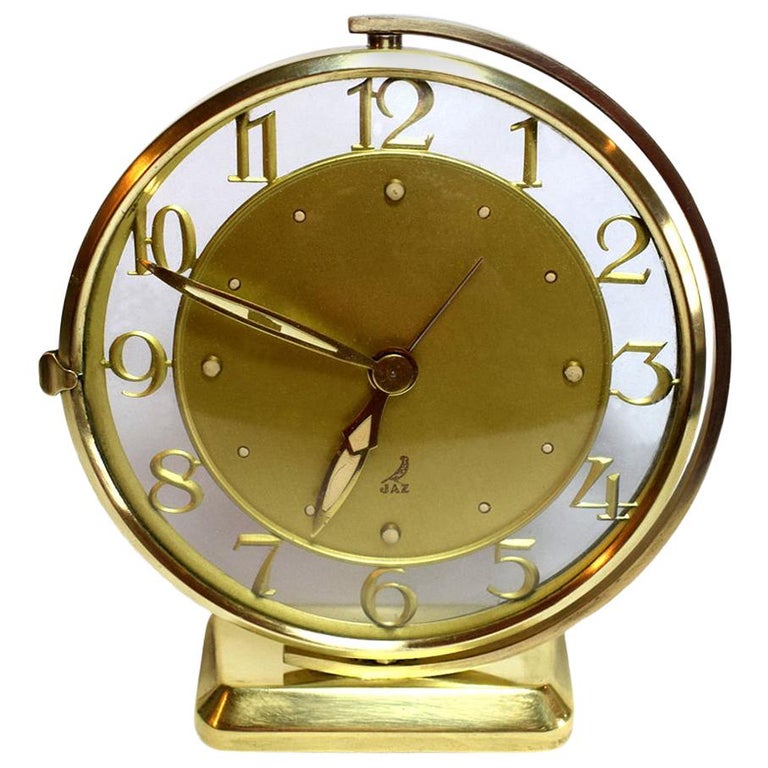 Art Deco Glass and Brass Clock by JAZ at 1stDibs