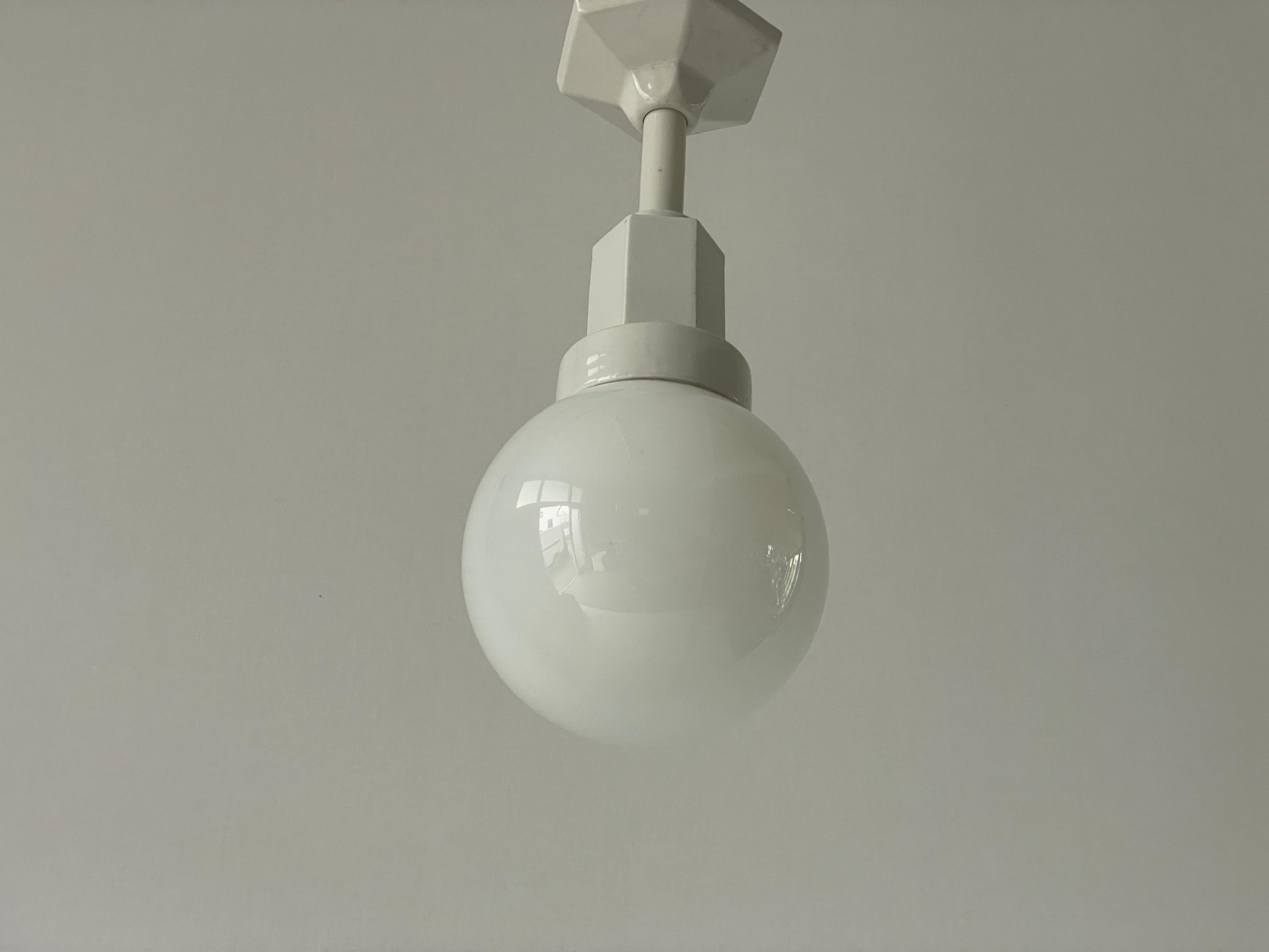 Art Deco Glass Ball and White Ceramic Body Pendant Lamp, 1950s, Italy In Excellent Condition For Sale In Hagenbach, DE