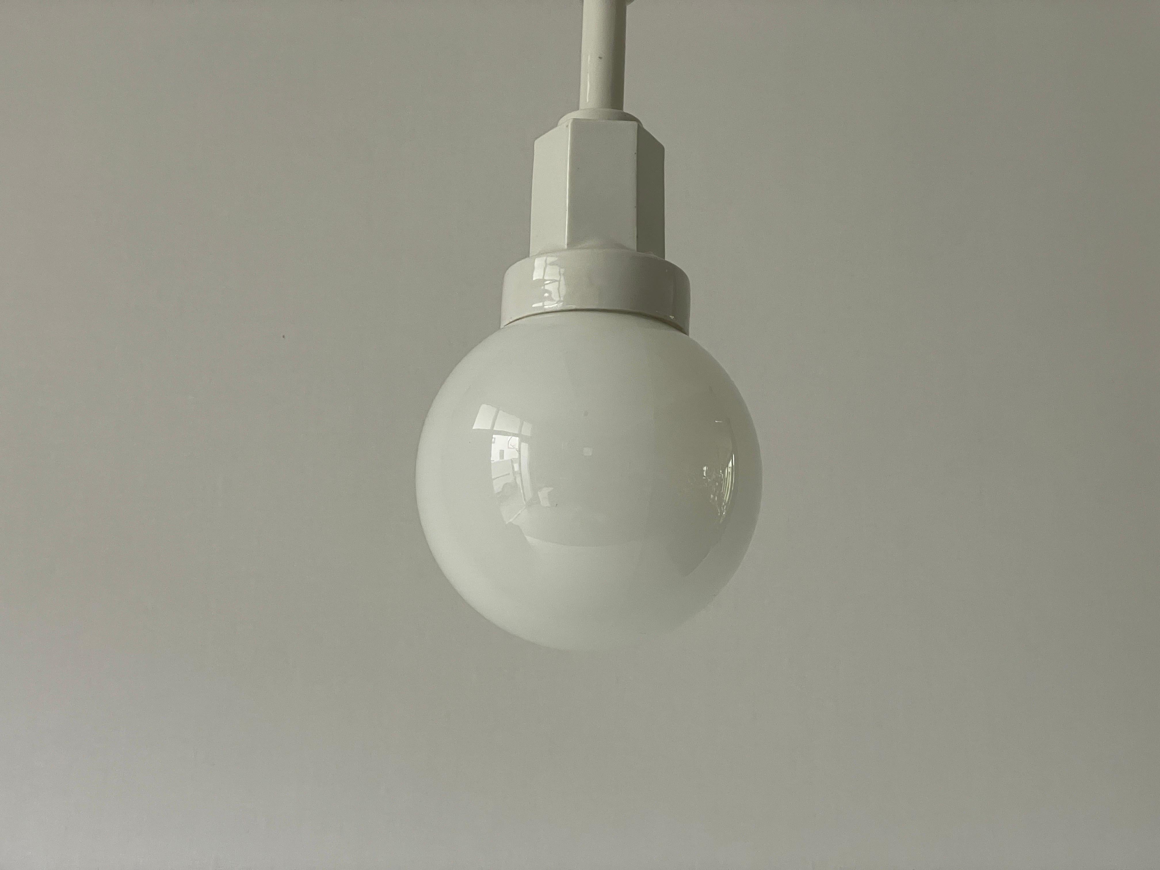 Mid-20th Century Art Deco Glass Ball and White Ceramic Body Pendant Lamp, 1950s, Italy For Sale