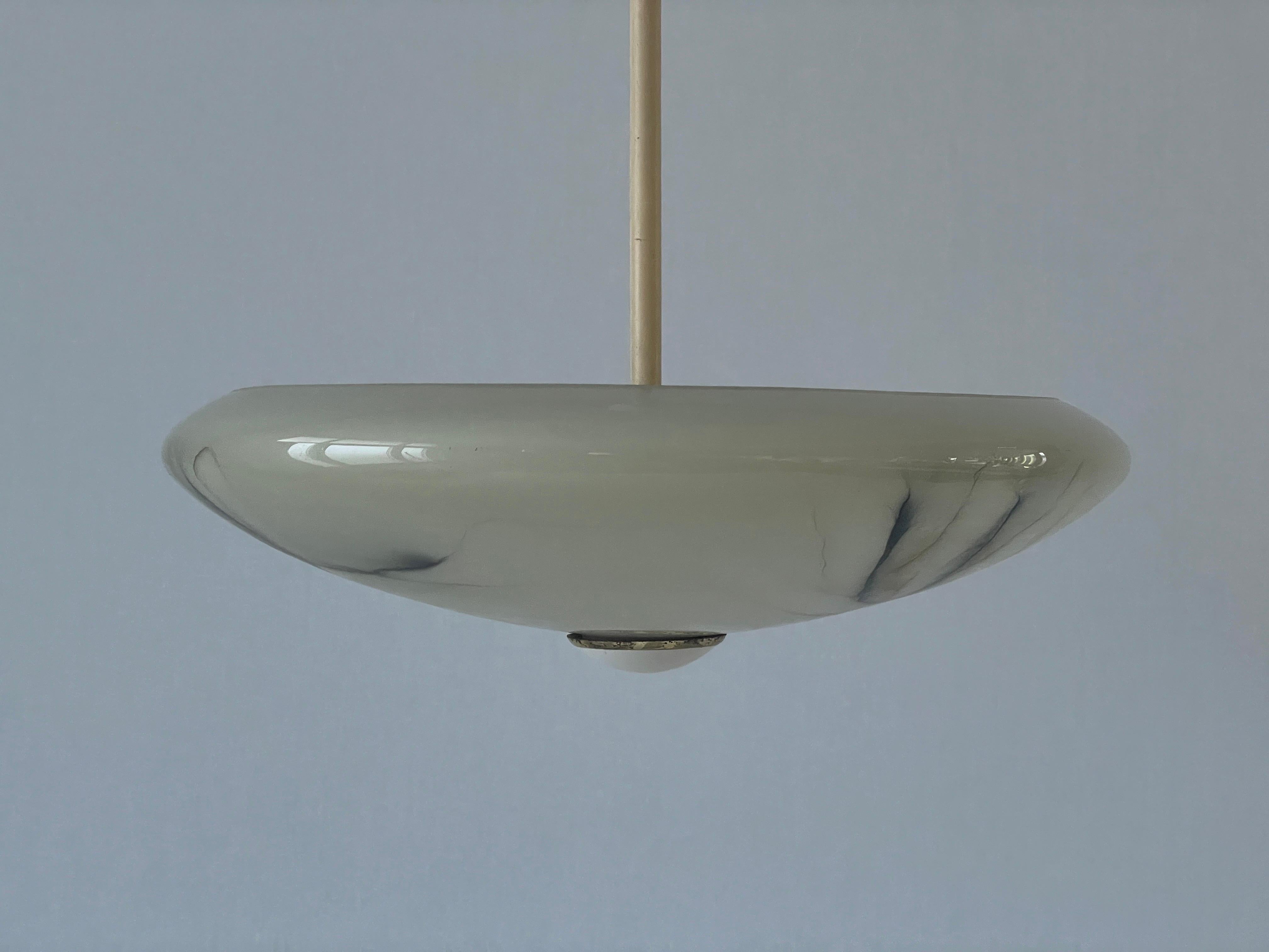 Art Deco Glass Ceiling Lamp by VEB Leuchten, 1940s, Germany

Lampshade is in very good vintage condition.

This lamp works with E27 light bulb 
Wired and suitable to use with 220V and 110V for all countries.

Measurements: 
Height: 56 cm
Shade
