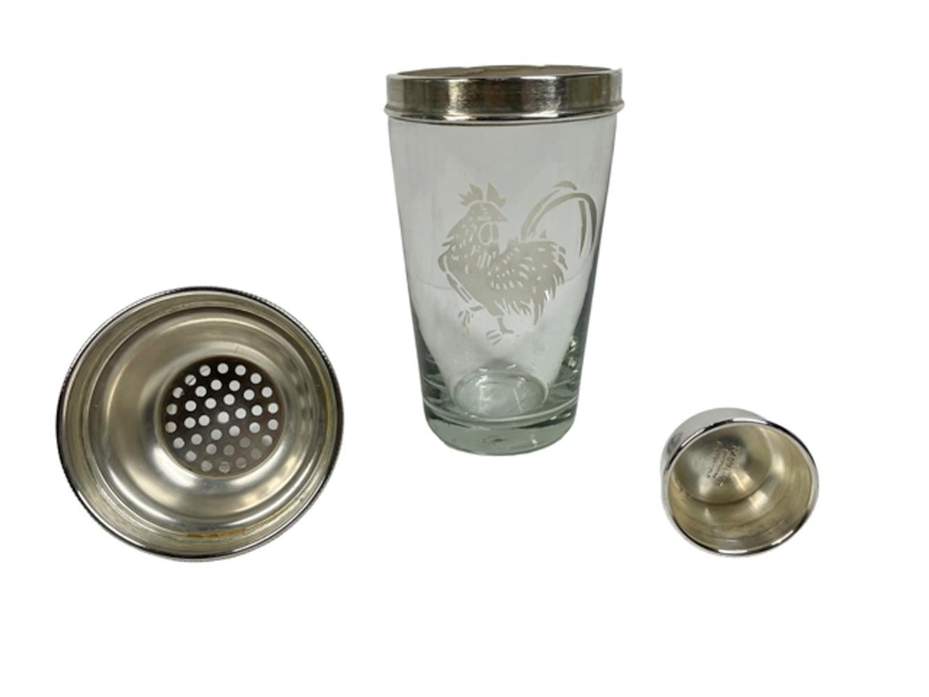 Art Deco cocktail shaker in clear glass etched with a rooster and with a two part silver plate cover with integral strainer. Marked for James Dixon & Sons and Made in England in side the cap.