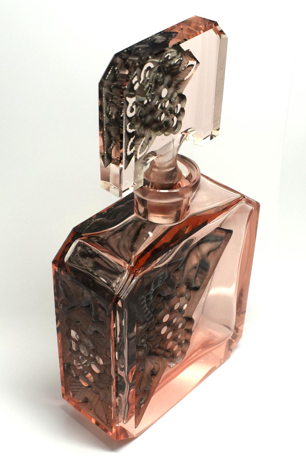 For your consideration is this fabulous Art Deco decanter set with 6 matching glasses is intricately detailed facet-cut glass with acid mat relief panels in a pale rose pink glass, manufactured by Curt Schlevogt, who established his own glass