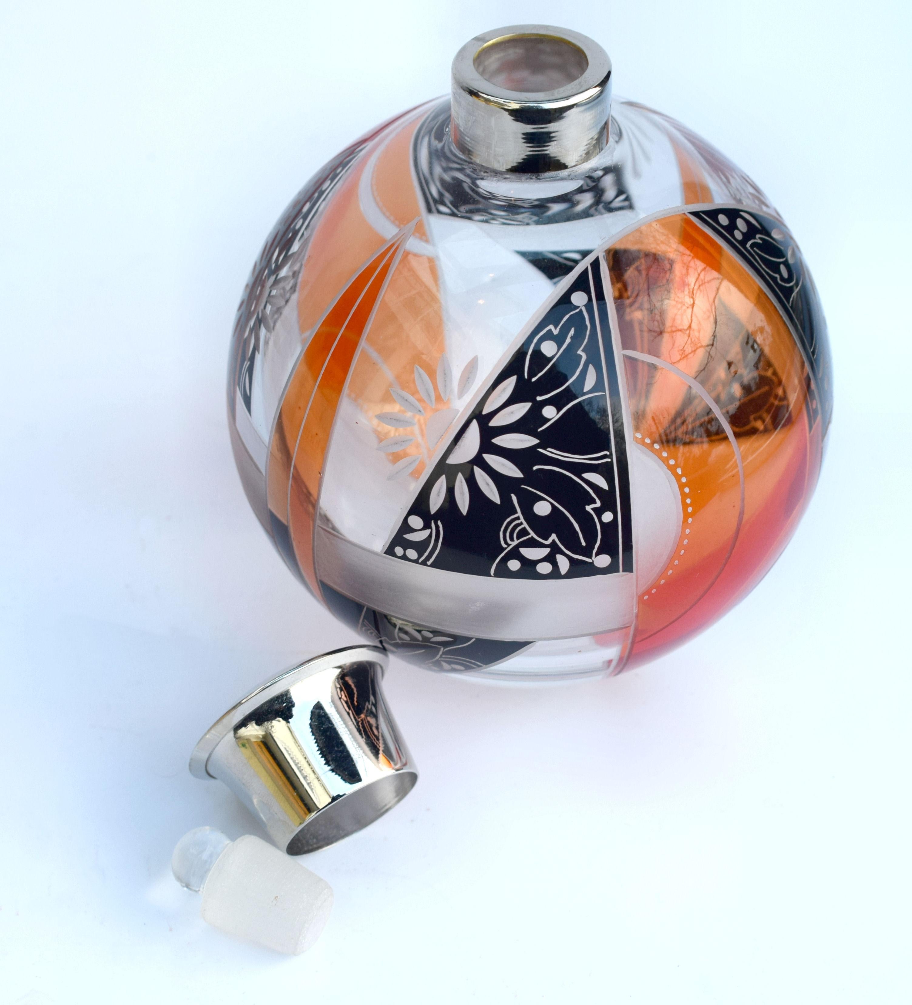 Such a rare find is this unusually large globe shaped Art Deco perfume bottle by Karl Palda. Absolutely exquisite, every angle and side has a different design. We really can't sing the praises of this enough, if you want something beautiful in your