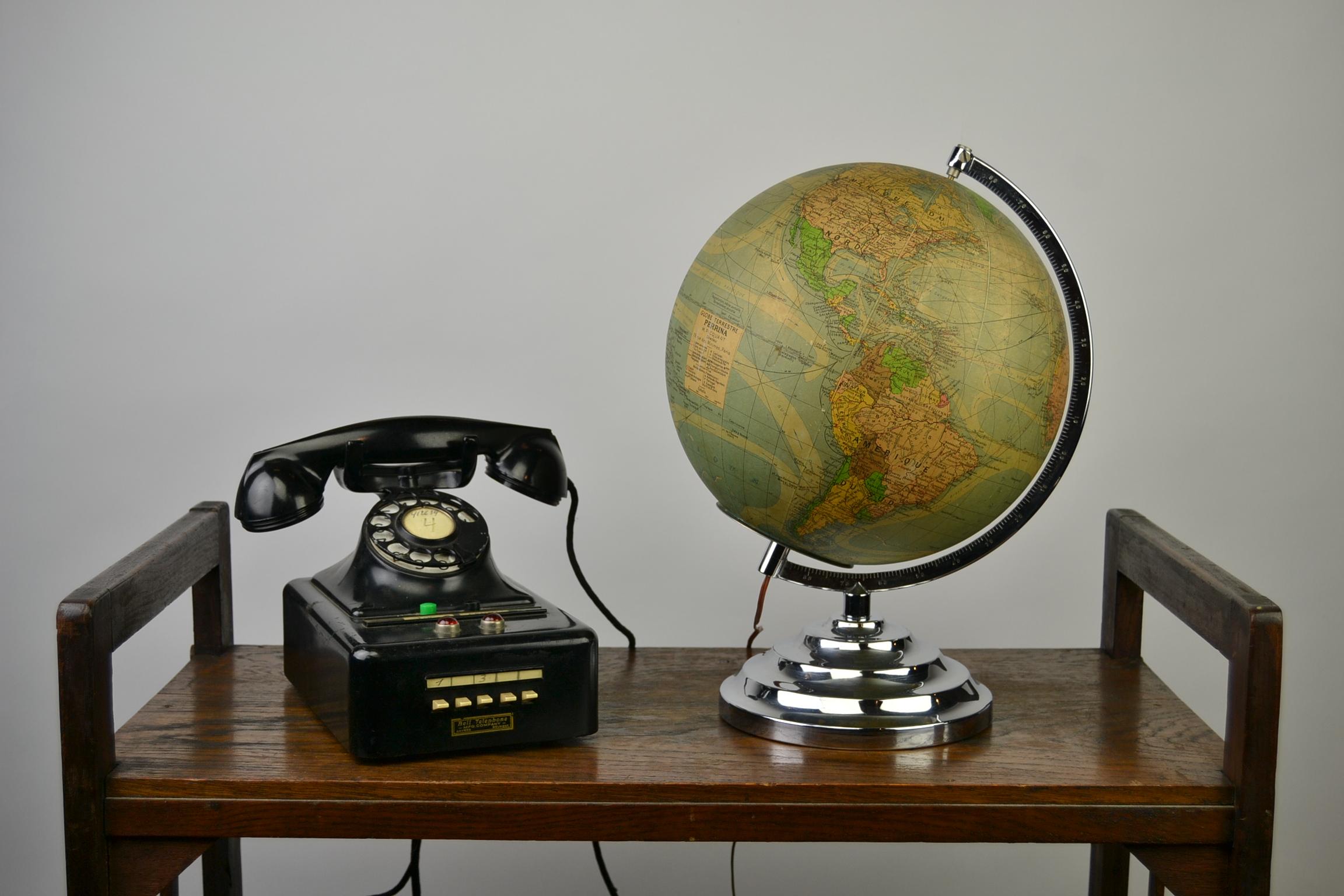 Art Deco illuminated World Globe by Perrina and M. Picquart - Paris - France, 1930s.
Glass globe on aluminium base with light inside. 
The Meridian half circle is also made of aluminium. 
On the Pre WWII World Map you still see Congo, the former