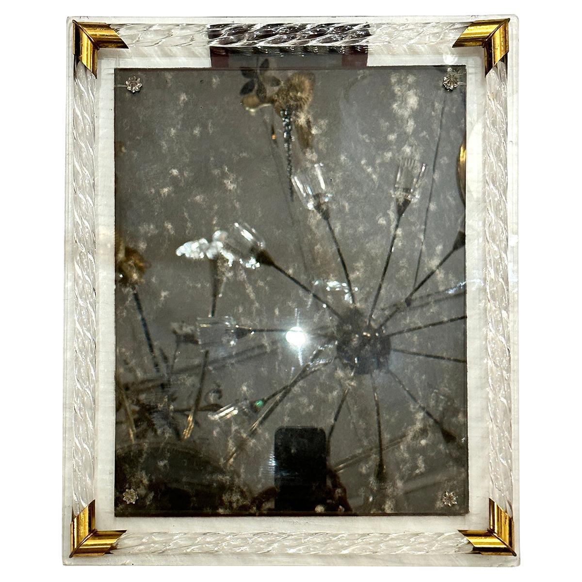 A circa 1930's picture frame with gilt details corner and etched glass front.

Measurements:
Height: 17