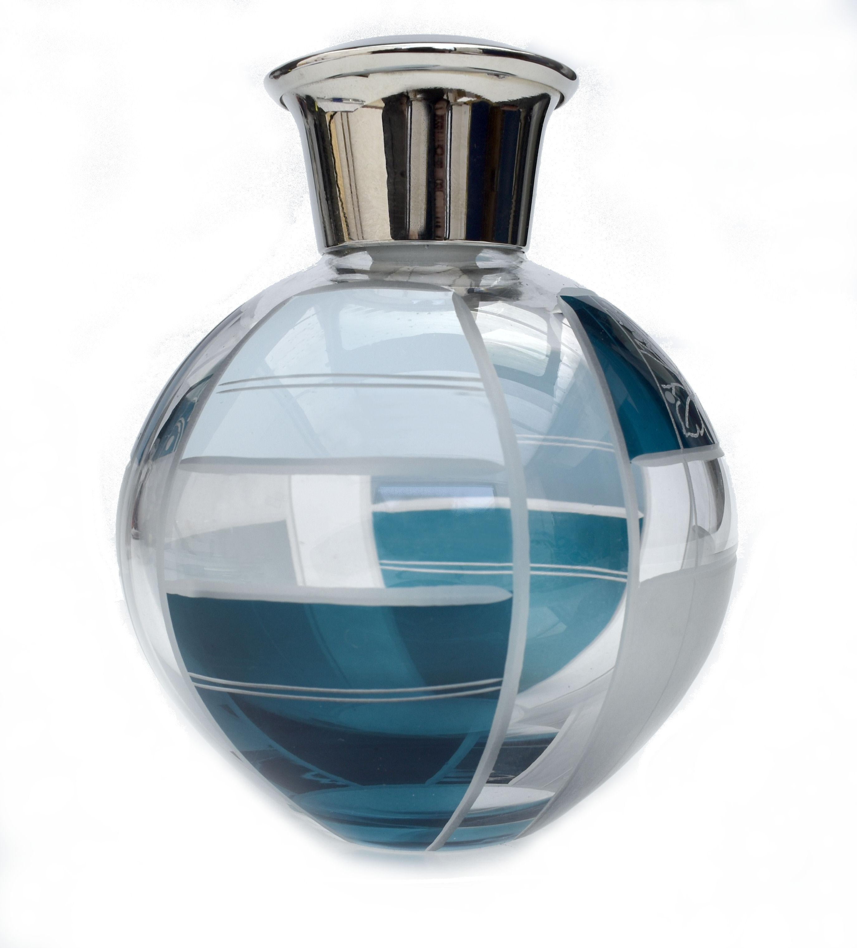1930s Art Deco perfume bottle by Karl Palda and absolutely exquisite, every angle and side has a different design. We really can't sing the praises of this enough, if you want something beautiful in your life then this is for you! Made from glass