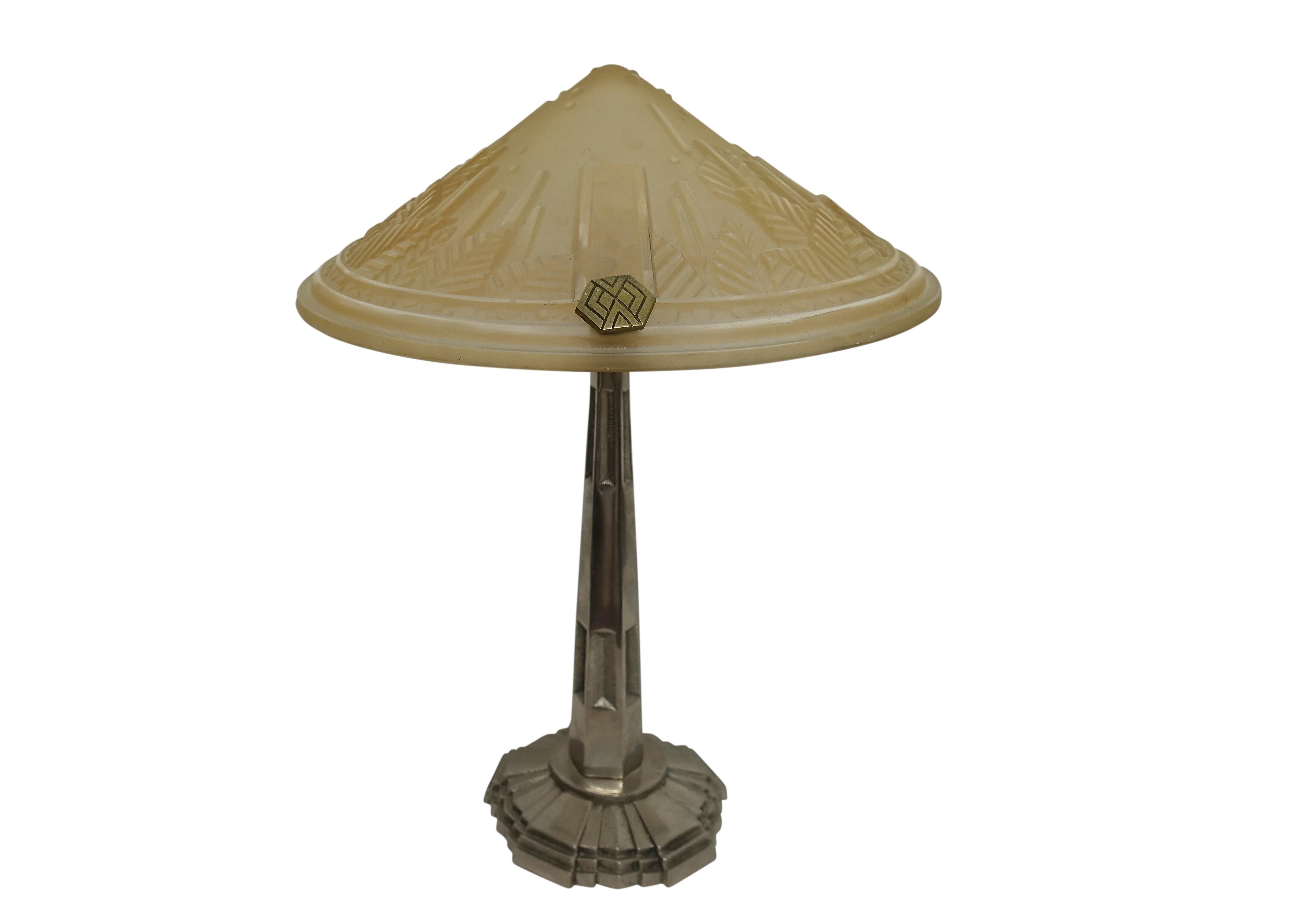 Lovely quality Art Deco period lamp, having a molded and acid etched opaque glass shade with a polished nickel base. Holds a single light bulb, and has a dimmer switch on the cloth cord.