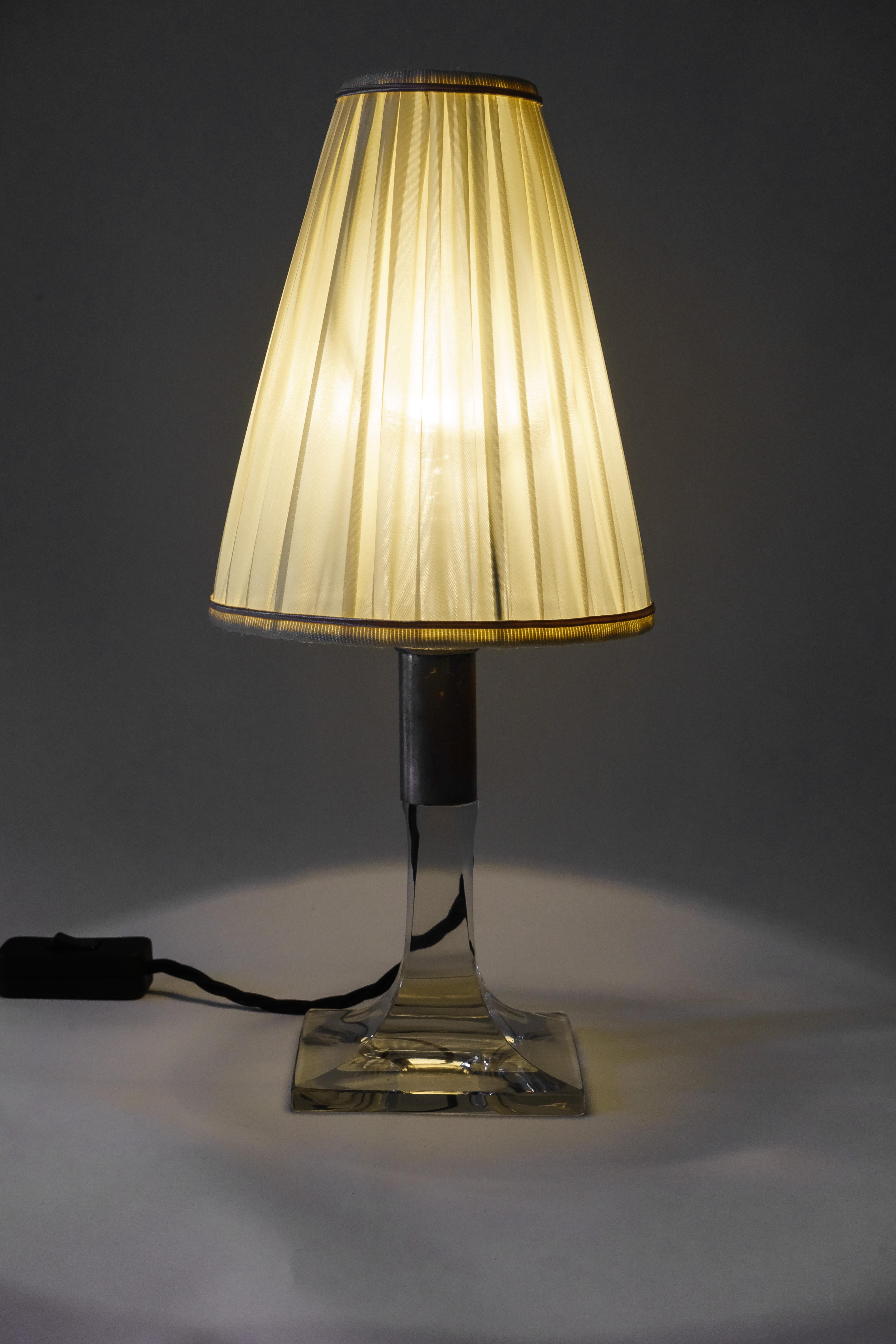 Art Deco glass table lamp with fabric shade Vienna, circa 1920s
Glass
Brass nickel-plated
Original condition
Fabric shade is replaced ( new ).