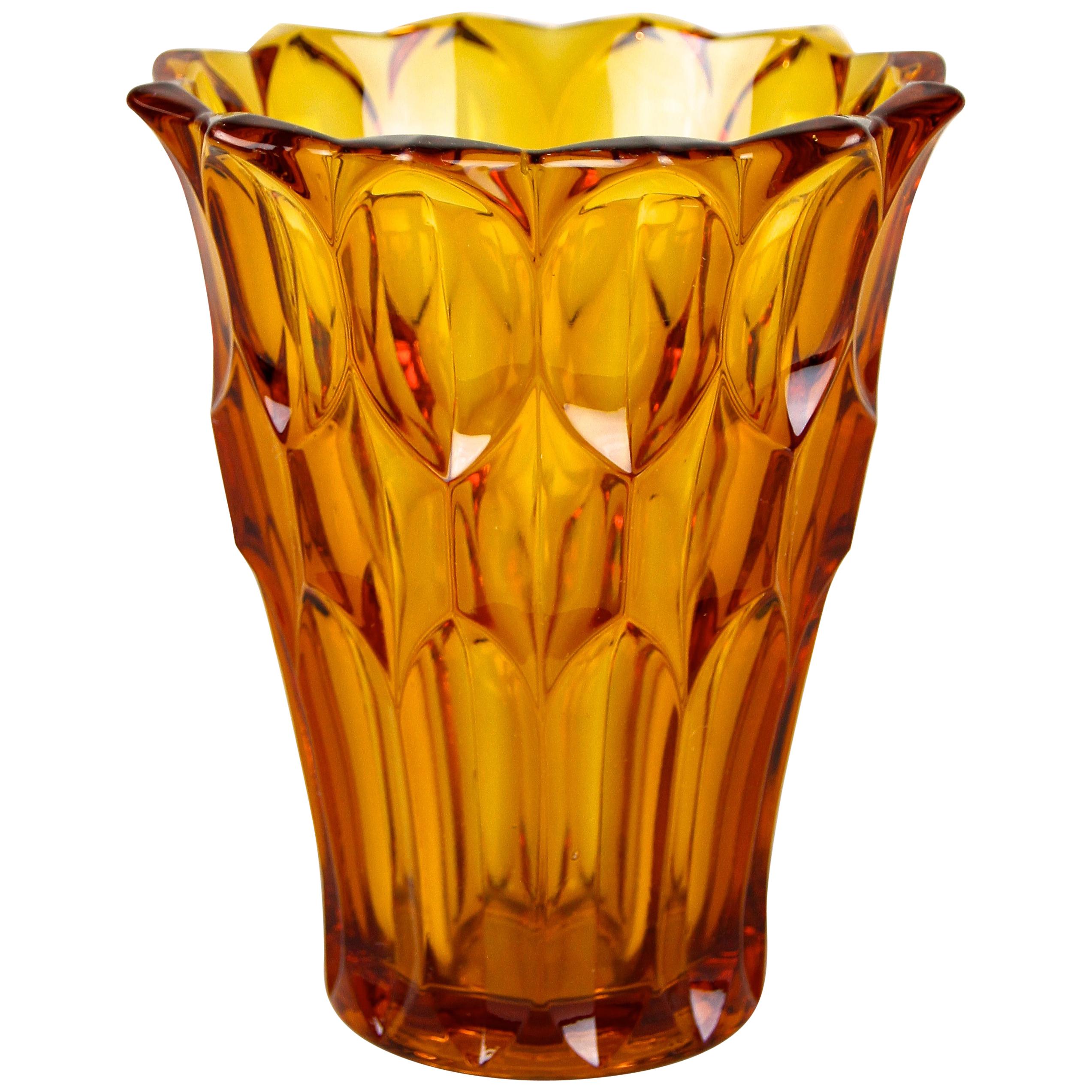 A Ribbed Elliptical Amber Pressed Glass Vase For Sale at 1stDibs