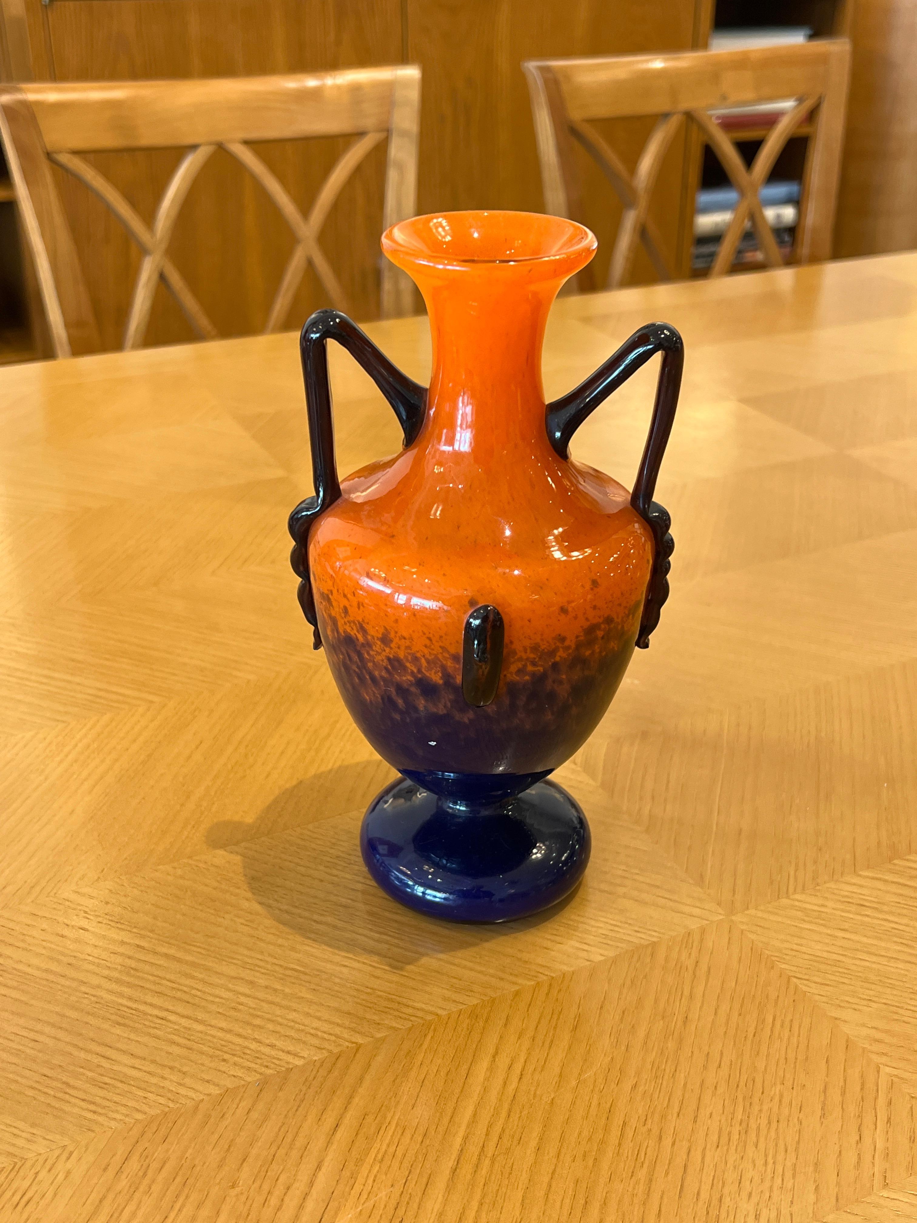 Art Deco glass vase by Charles Schneider studio piece in orange and cobalt blue colors with purple applications.

Signature: Schneider
