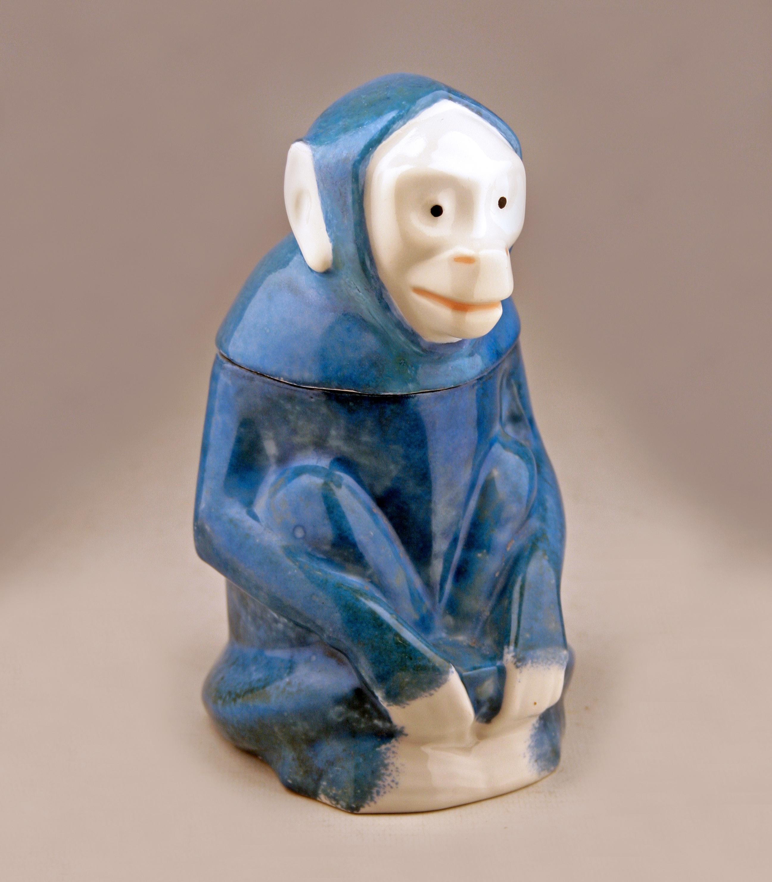 Art Déco glazed and hand-painted porcelain monkey tobbaco jar created by Edouard-Marcel Sandoz and manufactured by Theodore Haviland

By: Edouard-Marcel Sandoz, Theodore Haviland
Material: ceramic, paint, porcelain
Technique: hand-painted, glazed,