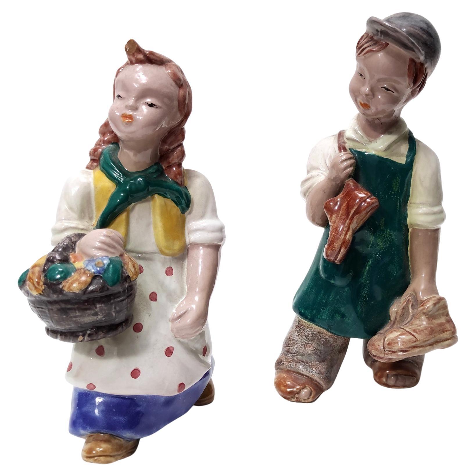 Pareja de Figuras de Cerámica Esmaltada Art Decó de la húngara Maria Rahmer en venta