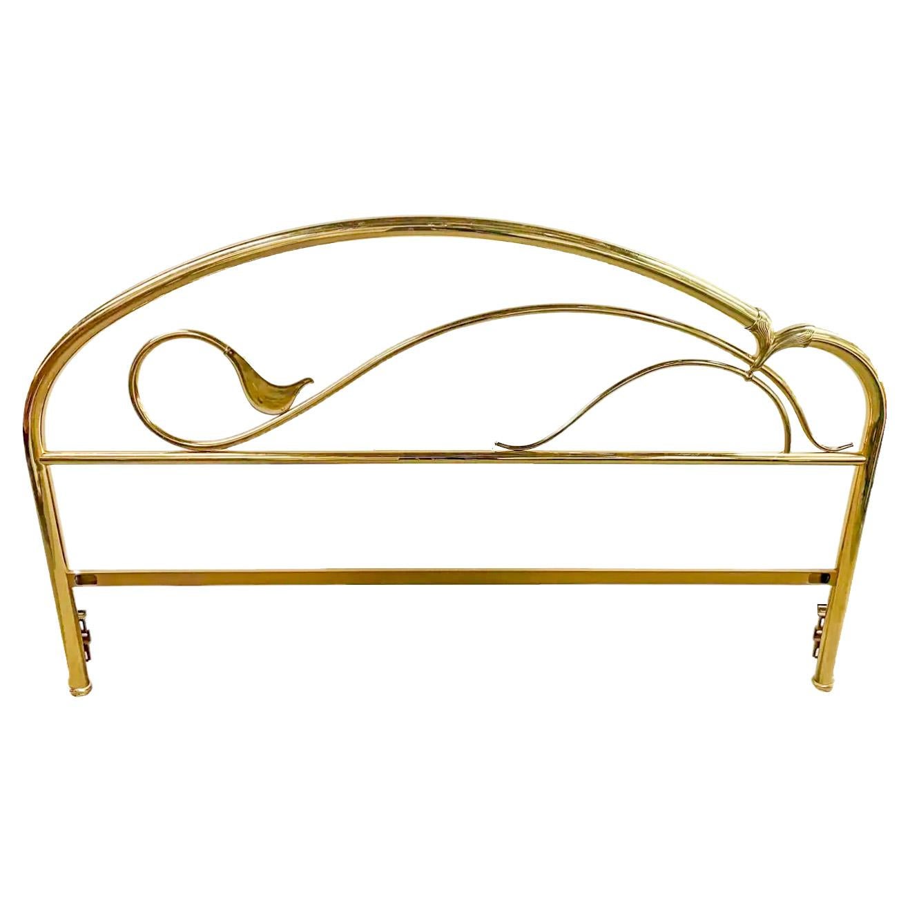 A beautiful solid brass Art Deco bed headboard. Fitting a queen size bed, the headboard elegant design features curvy lines and large leaves. With an Art Nouveau flair, the Art Deco headboard is simple yet rich in style and will elevate the design