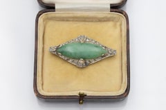 Art Deco gold brooch with jade and diamonds, France, circa 1925.