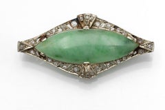 Art Deco gold brooch with jade and diamonds, France, circa 1925.