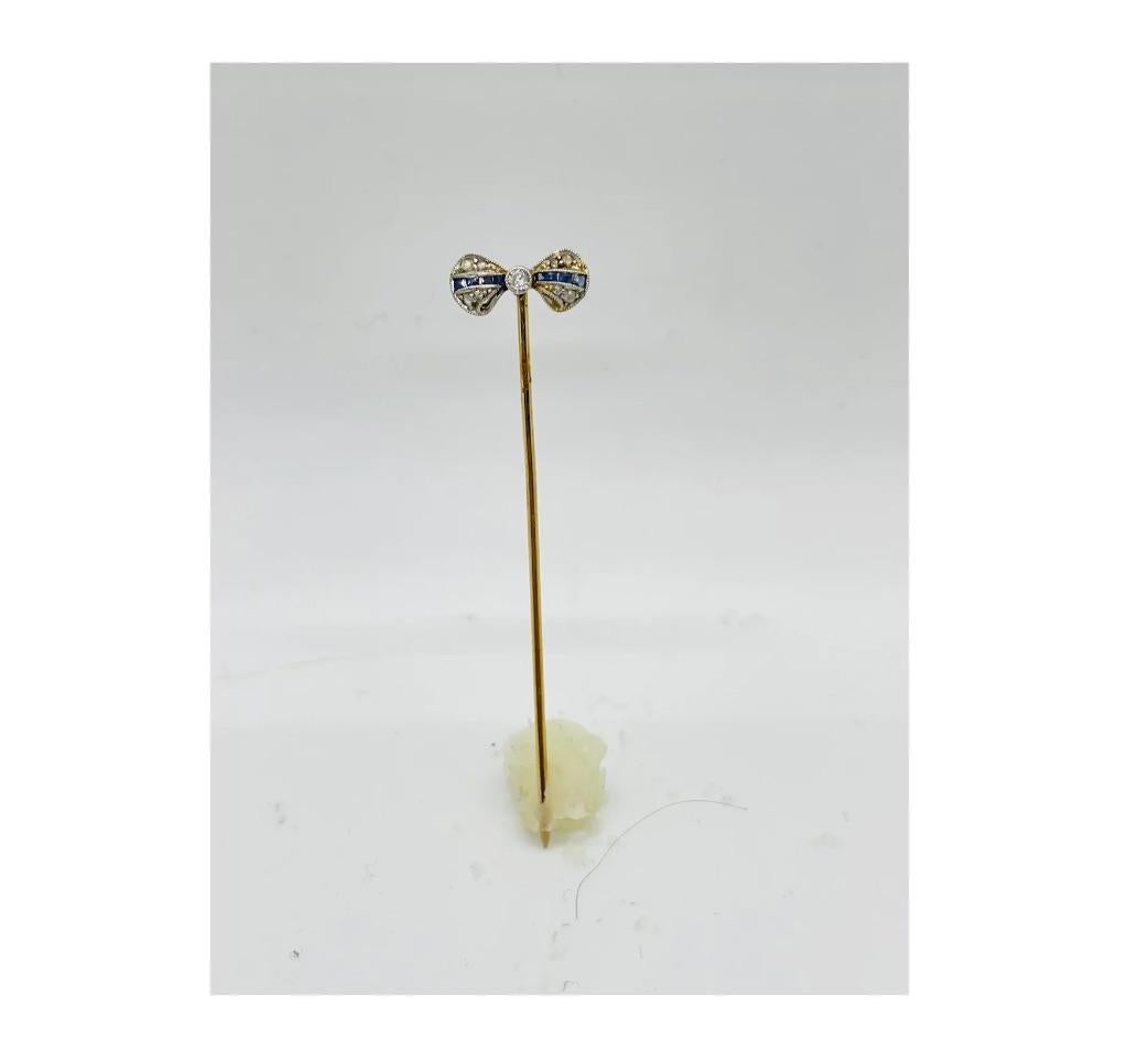 Art Deco Gold Diamond Bowtie Stickpin

Consistent with age and use please see the photos for condition
Please ask for more photos if you need we will send them with in 24-48 hours

Due to the item's age do not expect items to be in perfect condition