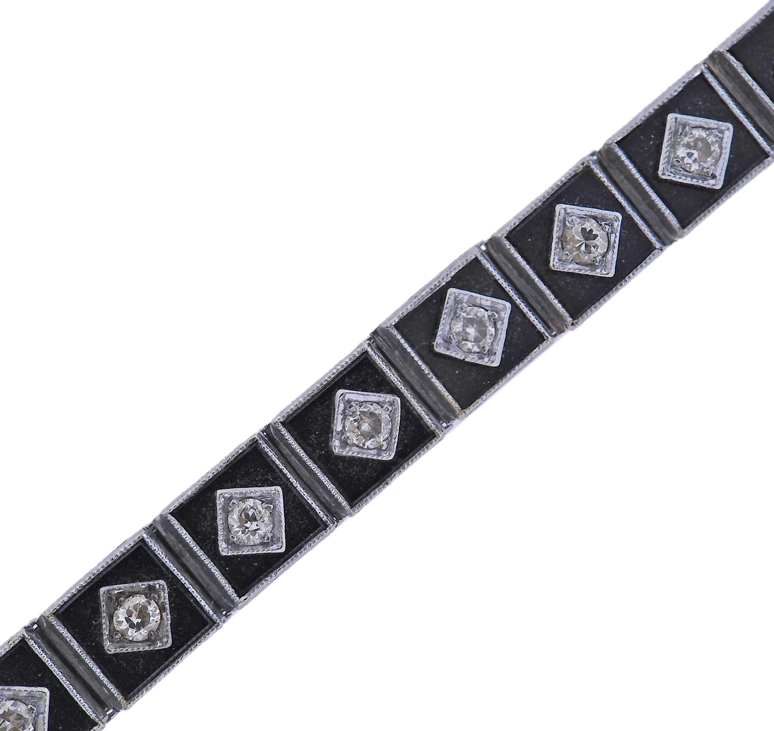 Bracelet Art Déco en or 14k, avec onyx et environ 1.00ctw en diamants. Le bracelet mesure 7 3/8