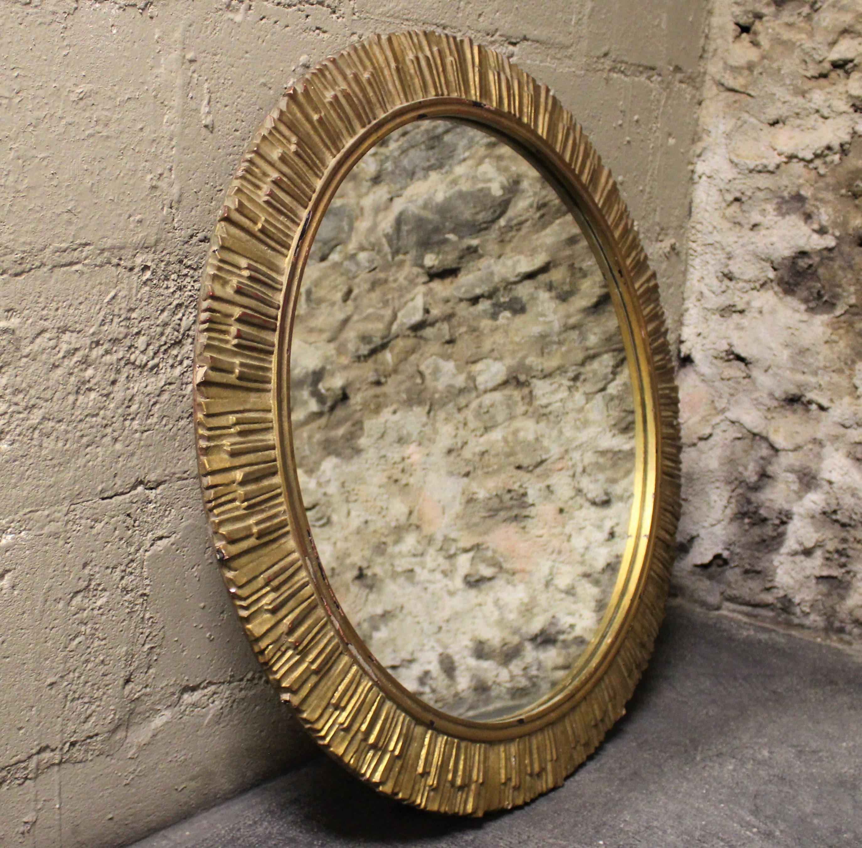 Art Deco gold gilded sunburst mirror.