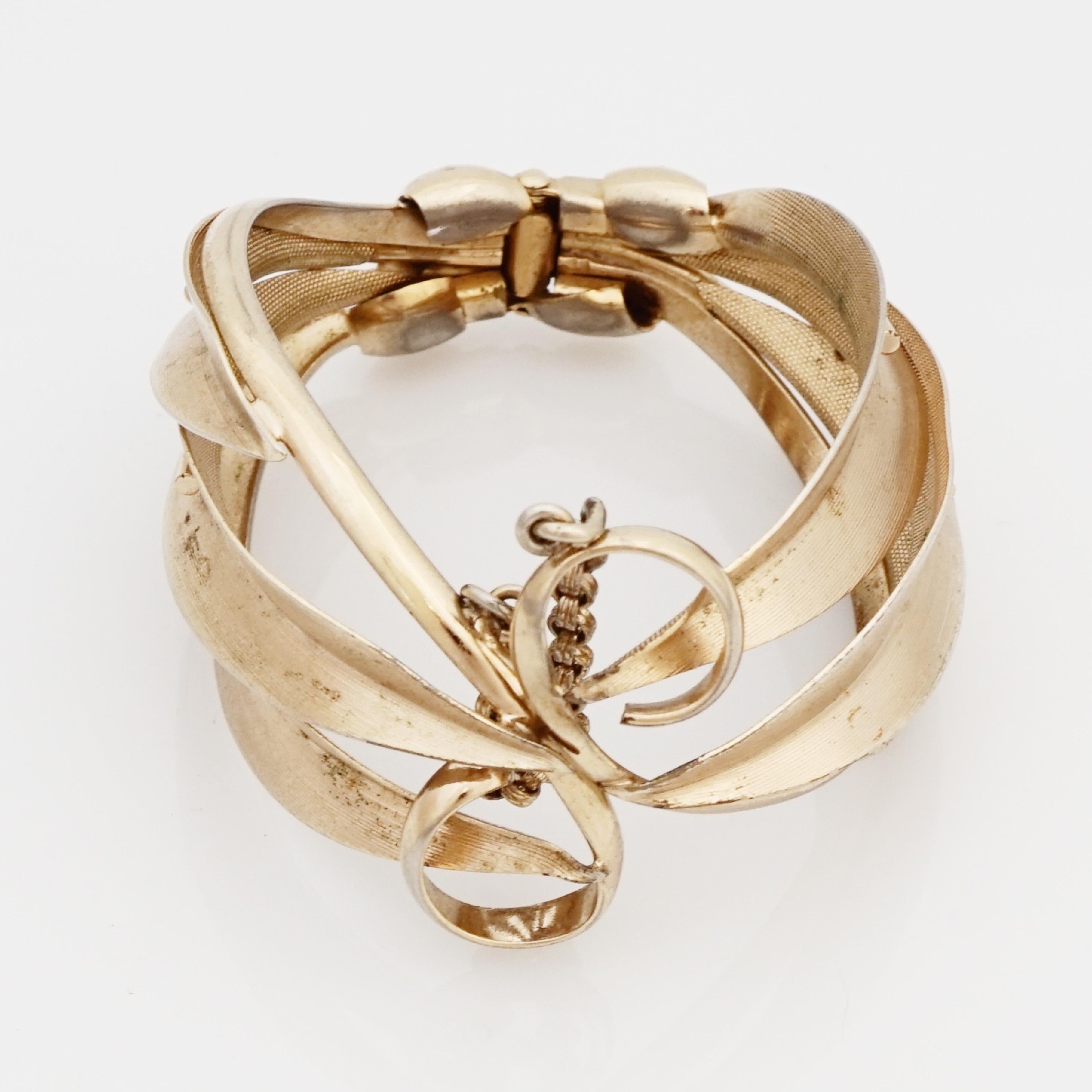 Modern Art Deco Gold Hinged Cuff Bracelet With S-Swirl Motif By Napier, 1920s
