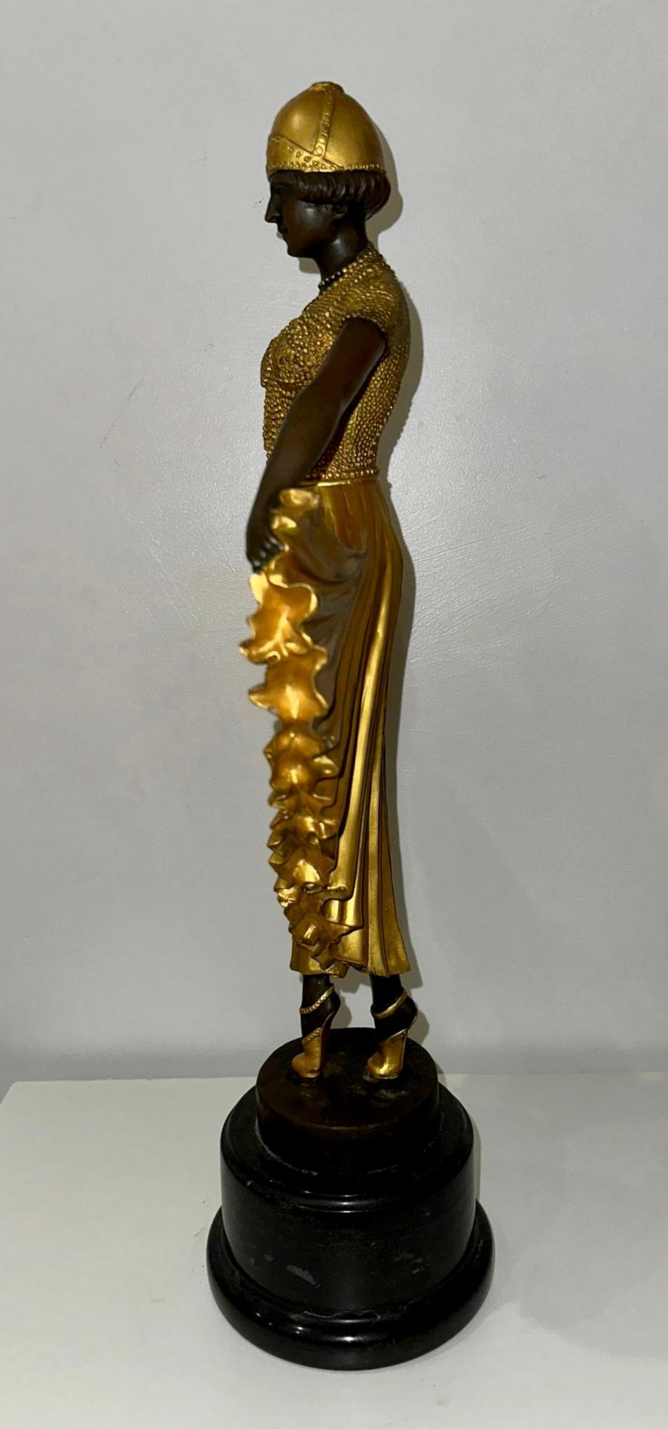 Ballerina di Demétre Chiparus 1886 - 1947
Grande scultura crisoelefantina in bronzo dorato Base in marmo.
Firmato 