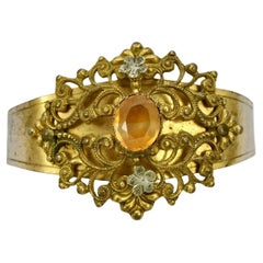 Antique Art Deco Gold Plated Filigree and Amber Paste Stone Bangle Bracelet circa 1930s