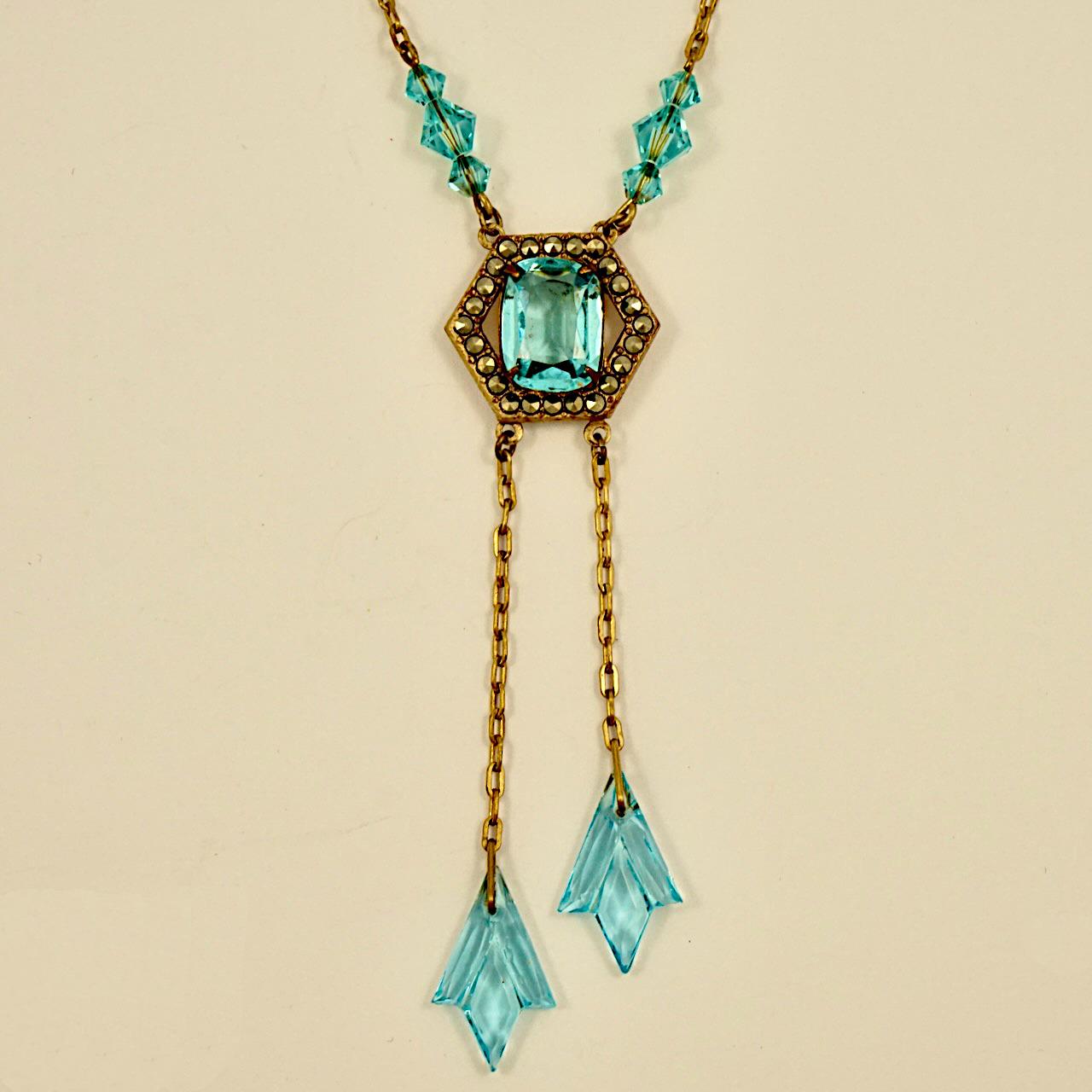 Beautiful Art Deco gold plated necklace, featuring aqua blue glass and a marcasite centrepiece with two drops. Measuring length 47.7 cm / 18.77 inches, and the centrepiece and longest glass drop is length 8 cm / 3.1 inch.

This is a fabulous aqua