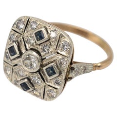 Goldring im Art déco-Stil mit Diamanten und Saphiren, 1930/1940er Jahre.
