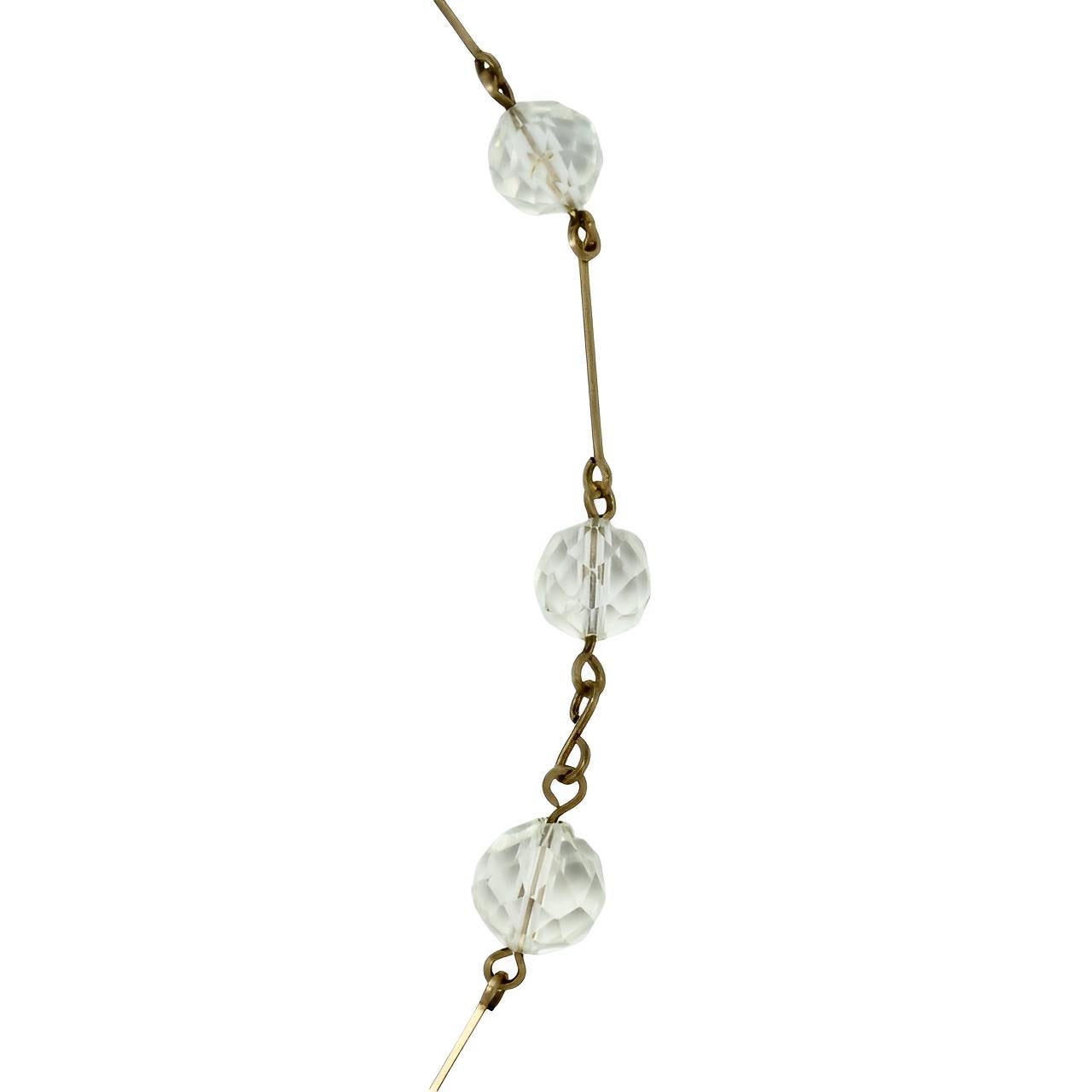 Art déco Collier Art Déco en fil d'or avec neuf perles de cristal à facettes circa 1930 en vente