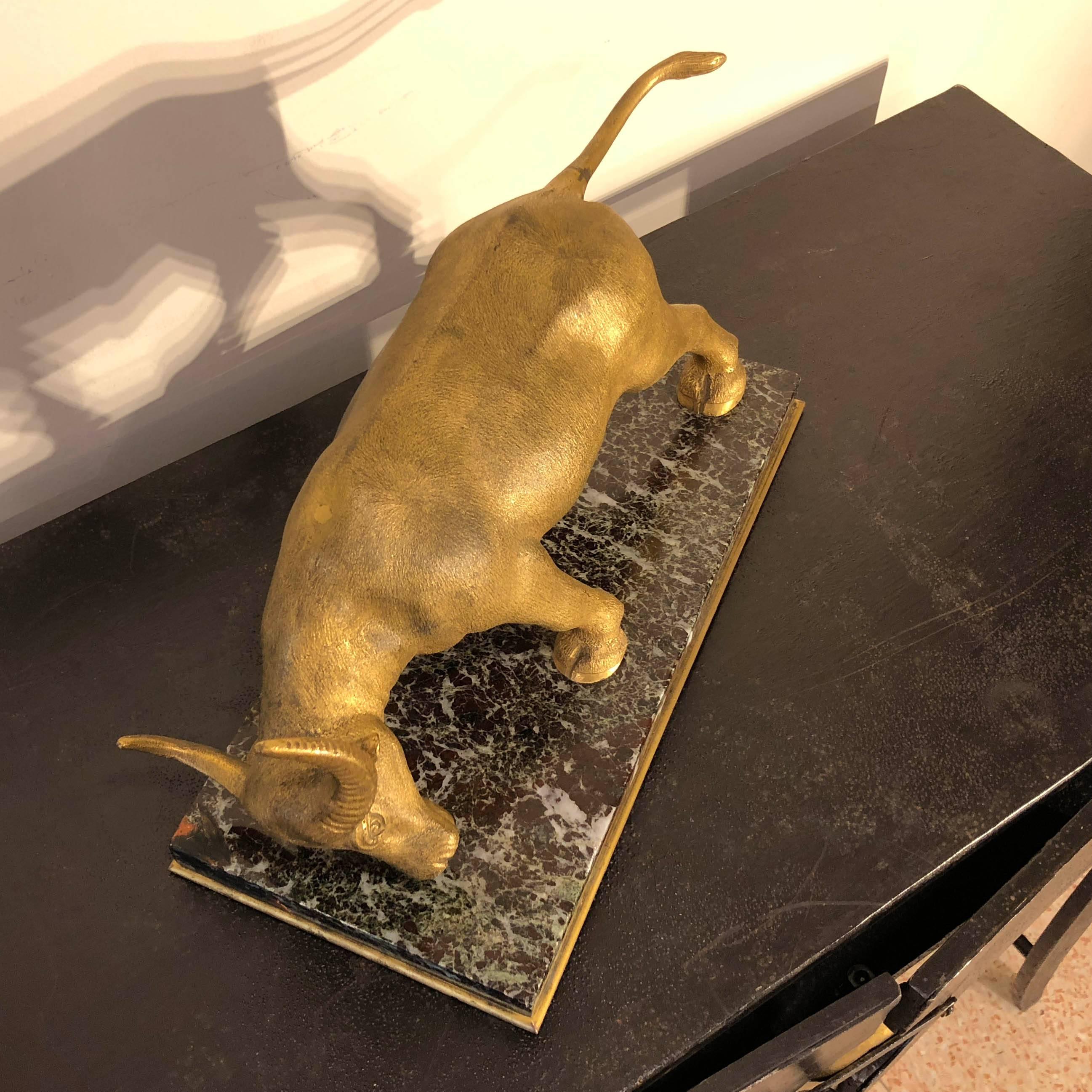 Decorative animal bronze sculpture representing a bull on a marble base golden bronze lined. Art Deco, France, early 20th century. Size: 36.5 x 17 cm, H 17 cm.
Perfect as charming Christmas gift or wedding present.














