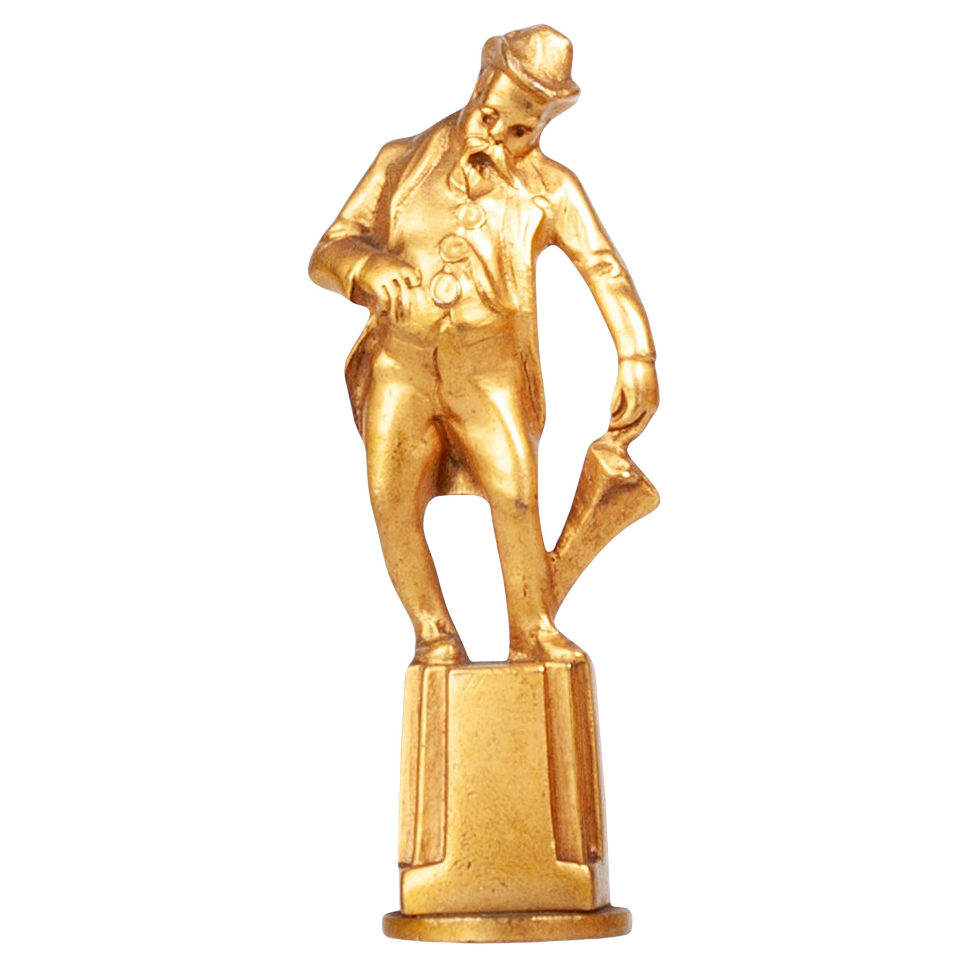 Pequeña escultura/figurilla Art Déco de bronce dorado Sello de un caballero, Inglaterra