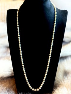 Art Deco Graduated Akoya Pearl Necklace with Diamond Platinum Clasp, circa 1925