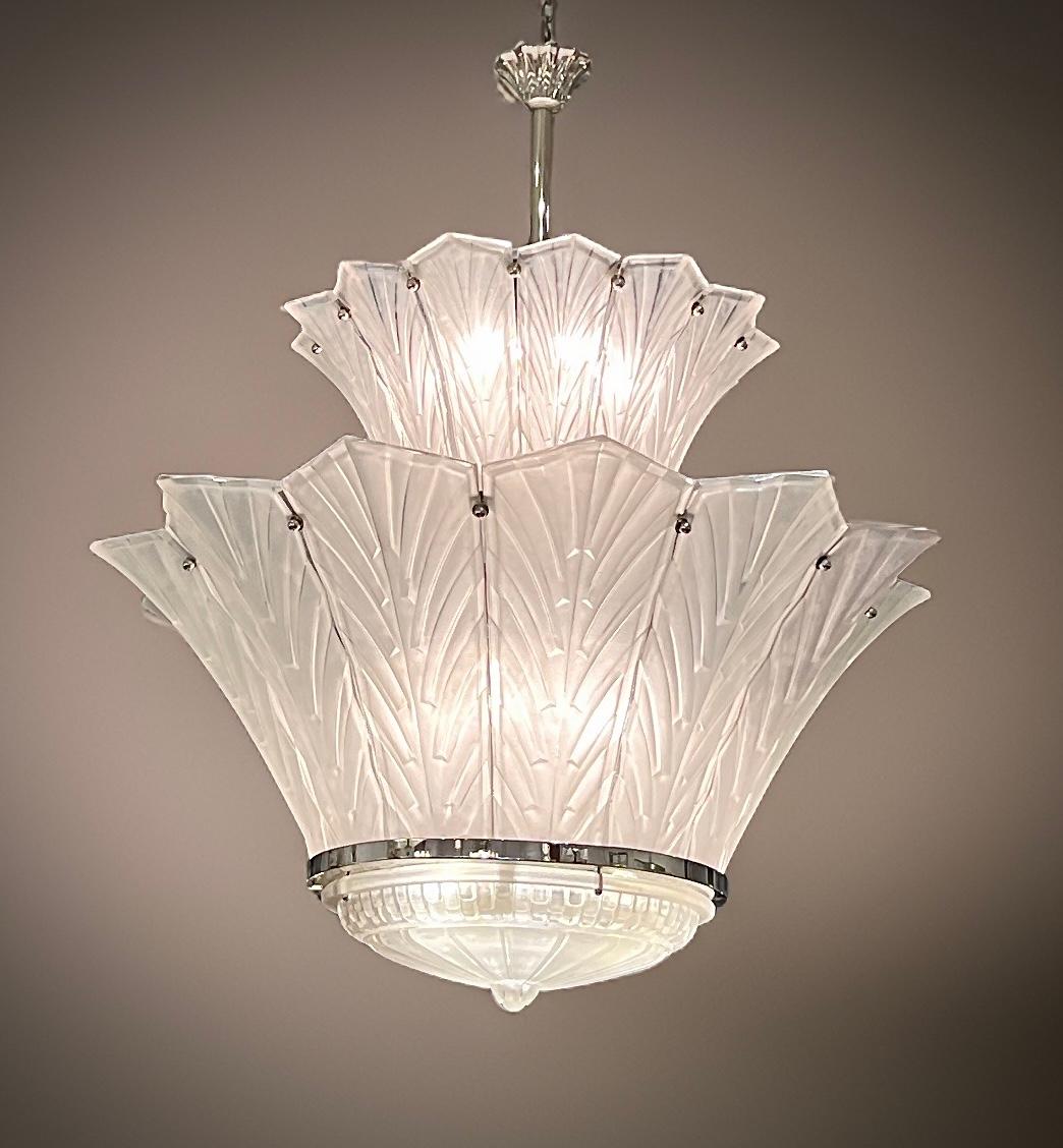 A magnificent 2-tear French Art Deco chandelier or pendant created by 