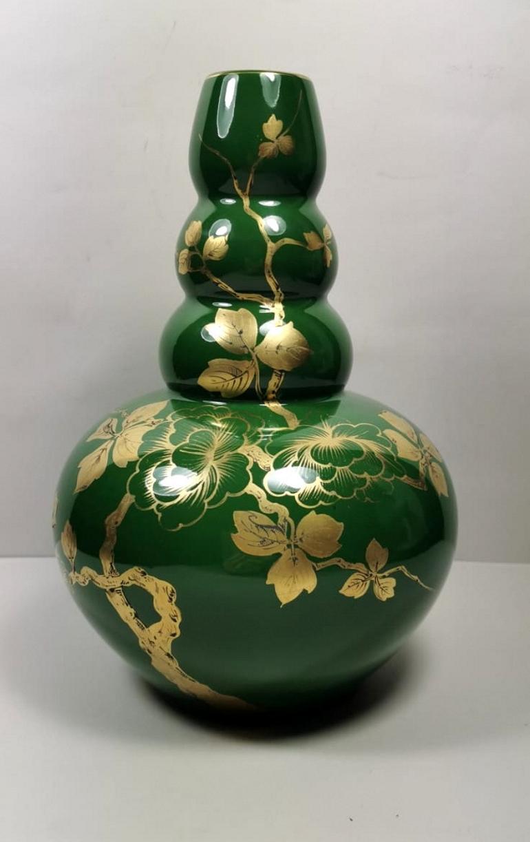 We kindly suggest you read the whole description, because with it we try to give you detailed technical and historical information to guarantee the authenticity of our objects.
Particular vase in green enameled terracotta with refined floral