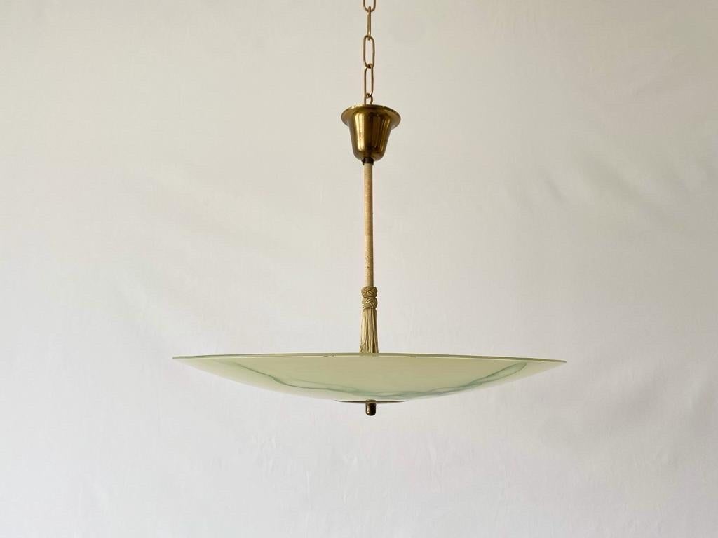 Art Deco Green Glass Ceiling Lamp, 1940s, Germany

This lamp works with 2x E27 light bulbs.

Measurements: 
Height: 42 cm
Shade diameter : 50 cm


