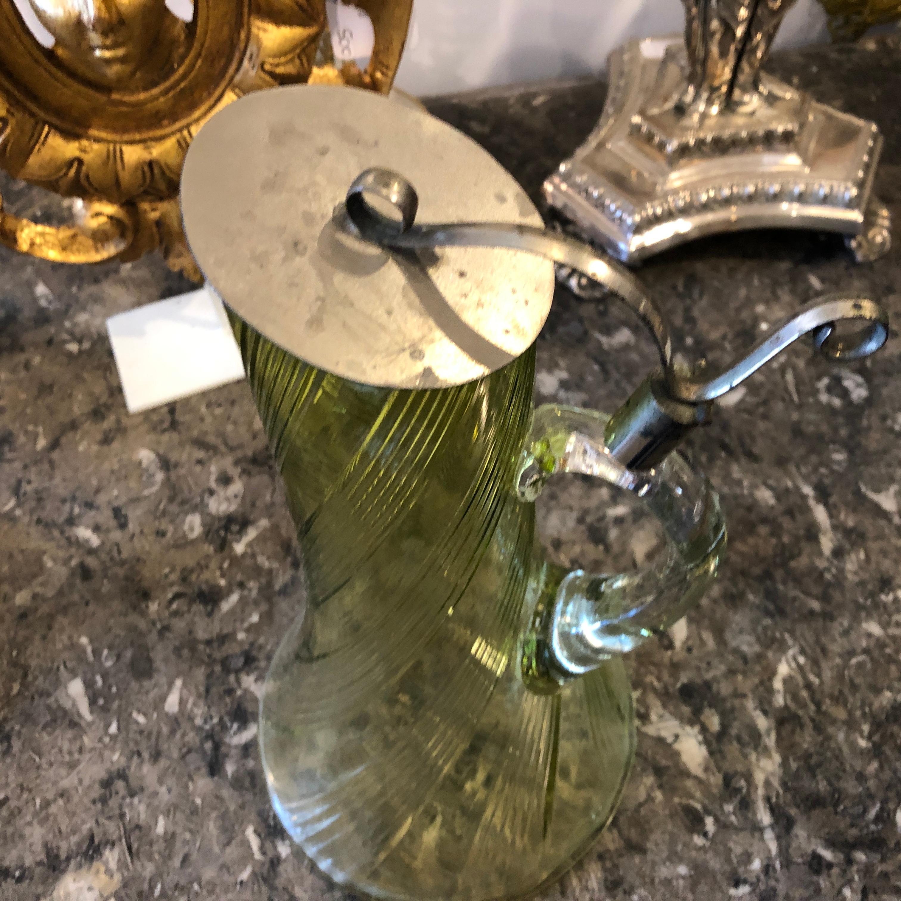 A glass and silver plated jug made in Italy in the 1930s in perfect conditions.