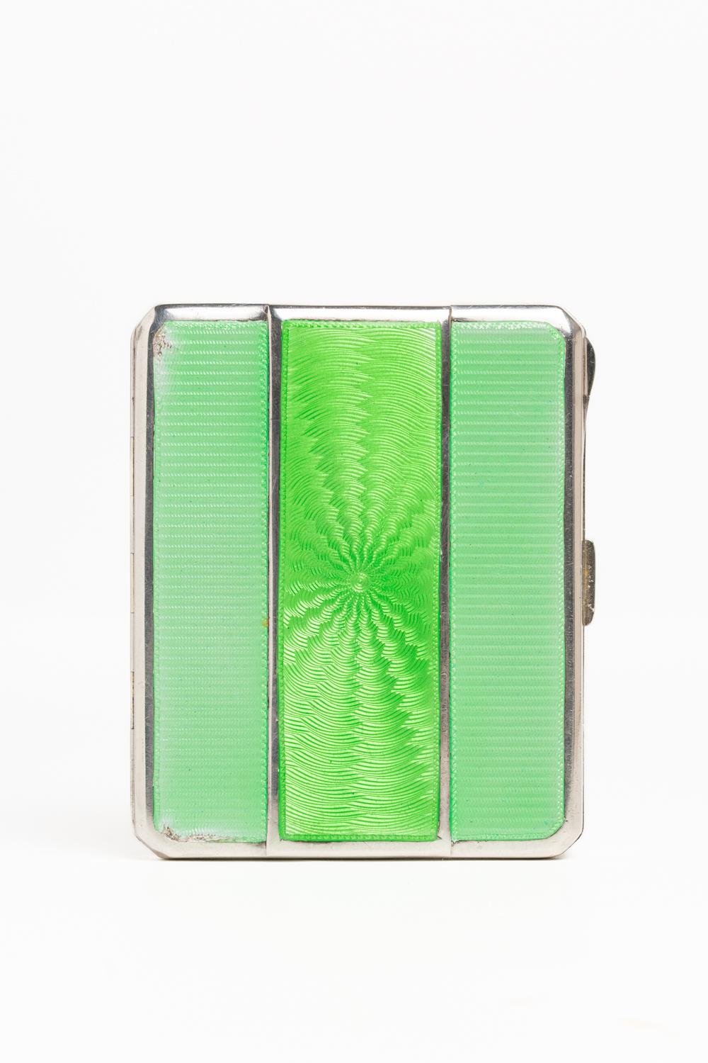 Rare and beautiful Art Deco pale green guilloche enamel and silver rectangular cigarette case by well known silversmiths Mappin and Webb, Birmingham 1933. The cigarette case has three panels, the central one with a sunburst design made in a darker