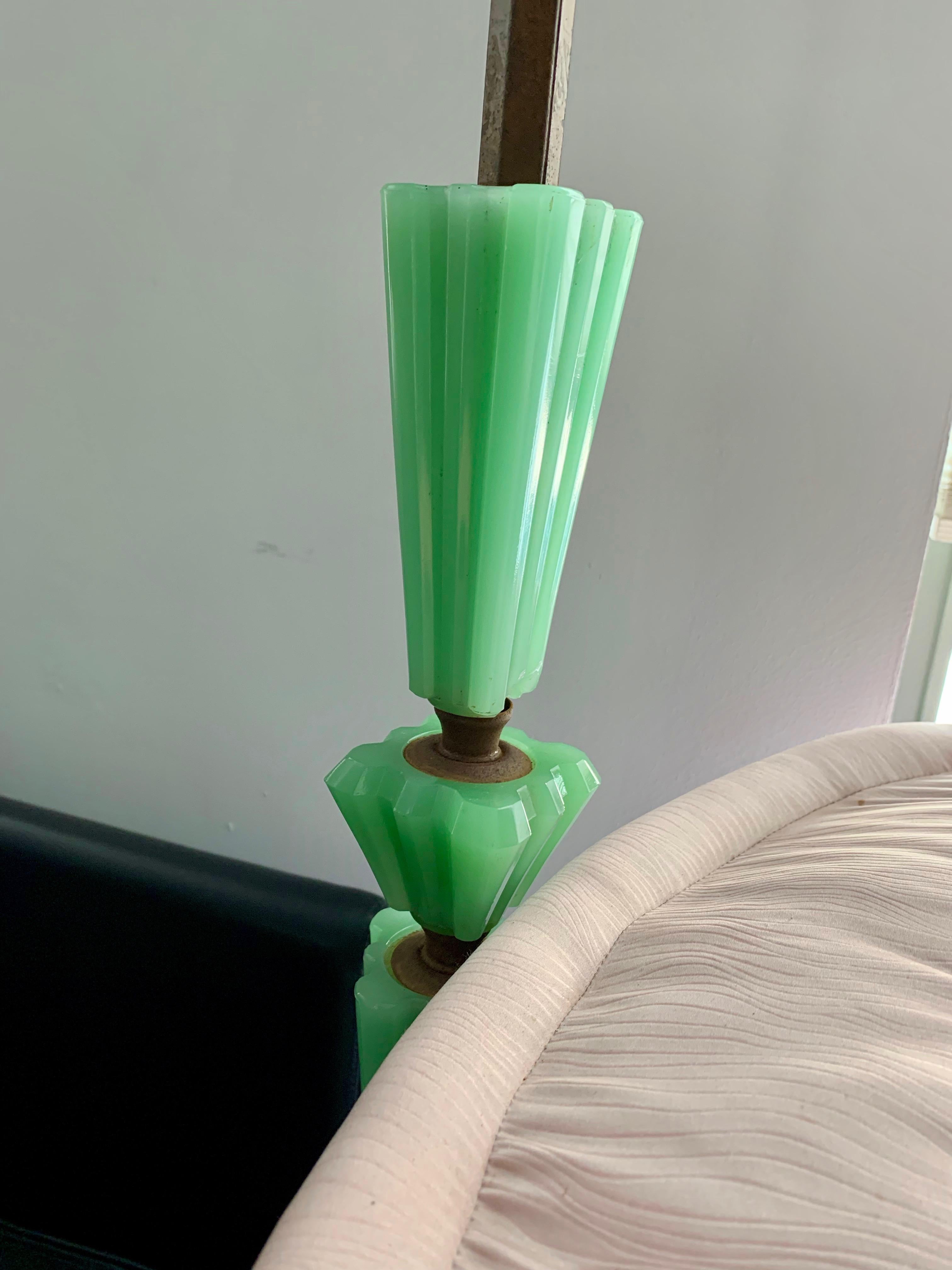 Art Deco Green Jadite and metal floor bridge lamp. Good color. Dimensions: H 60 inches, W 13 inches, D 10 inches.
 