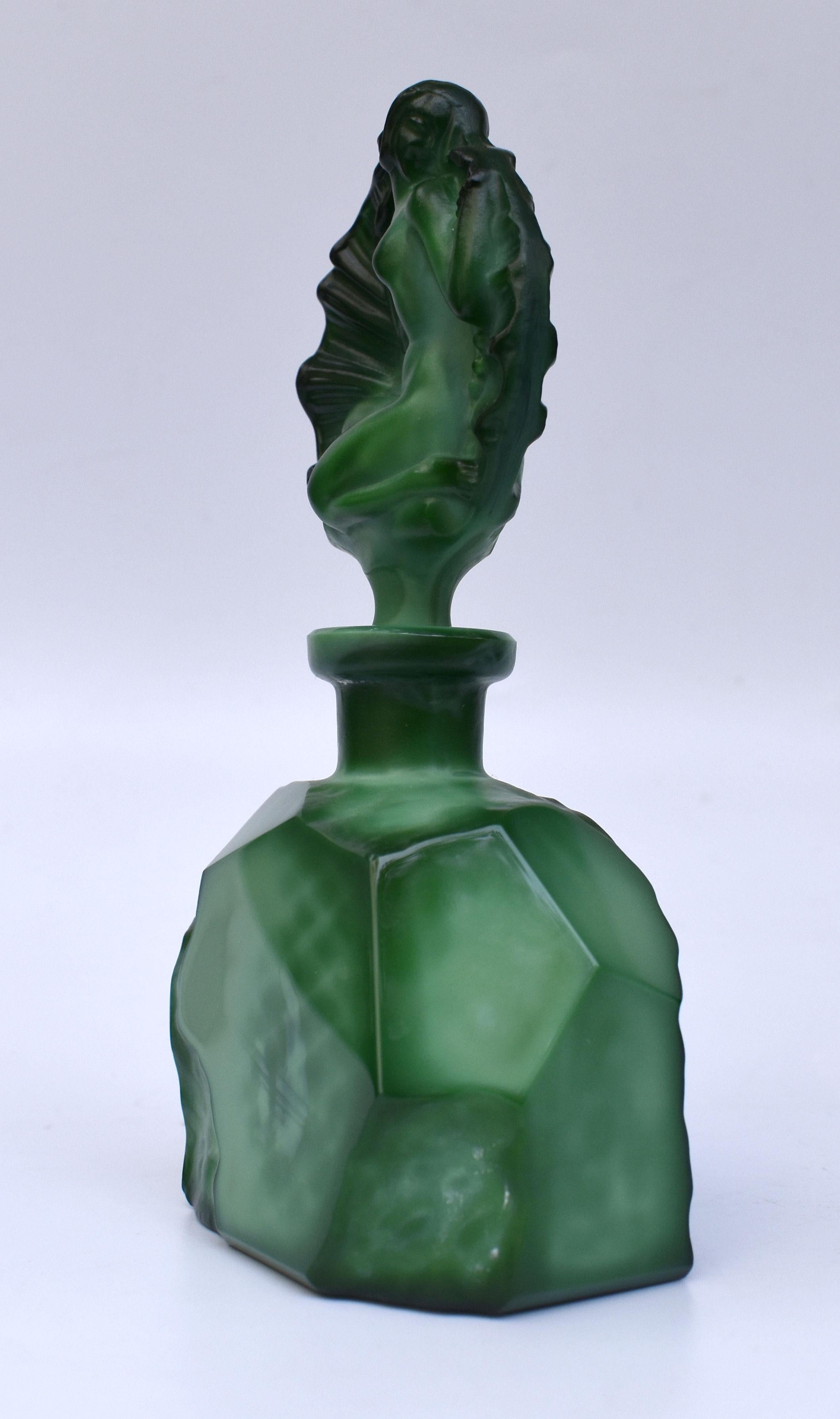green perfume bottle