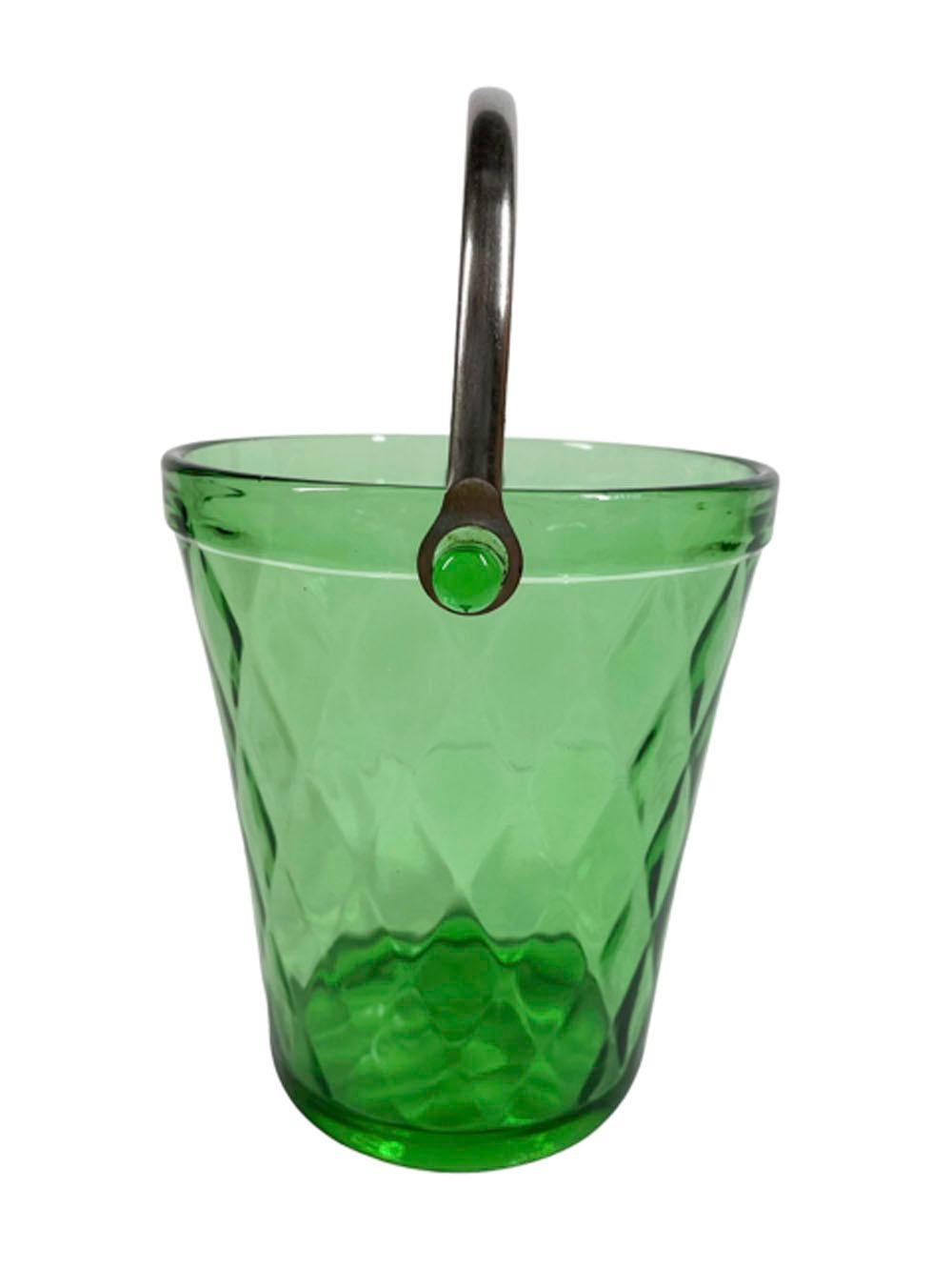 Art Deco green glass Ice bucket in mold-blown optic diamond pattern, the rim with molded lugs to which the metal swing handle attaches.