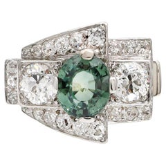 Art Deco green sapphire and diamond geometric cluster ring in platinum