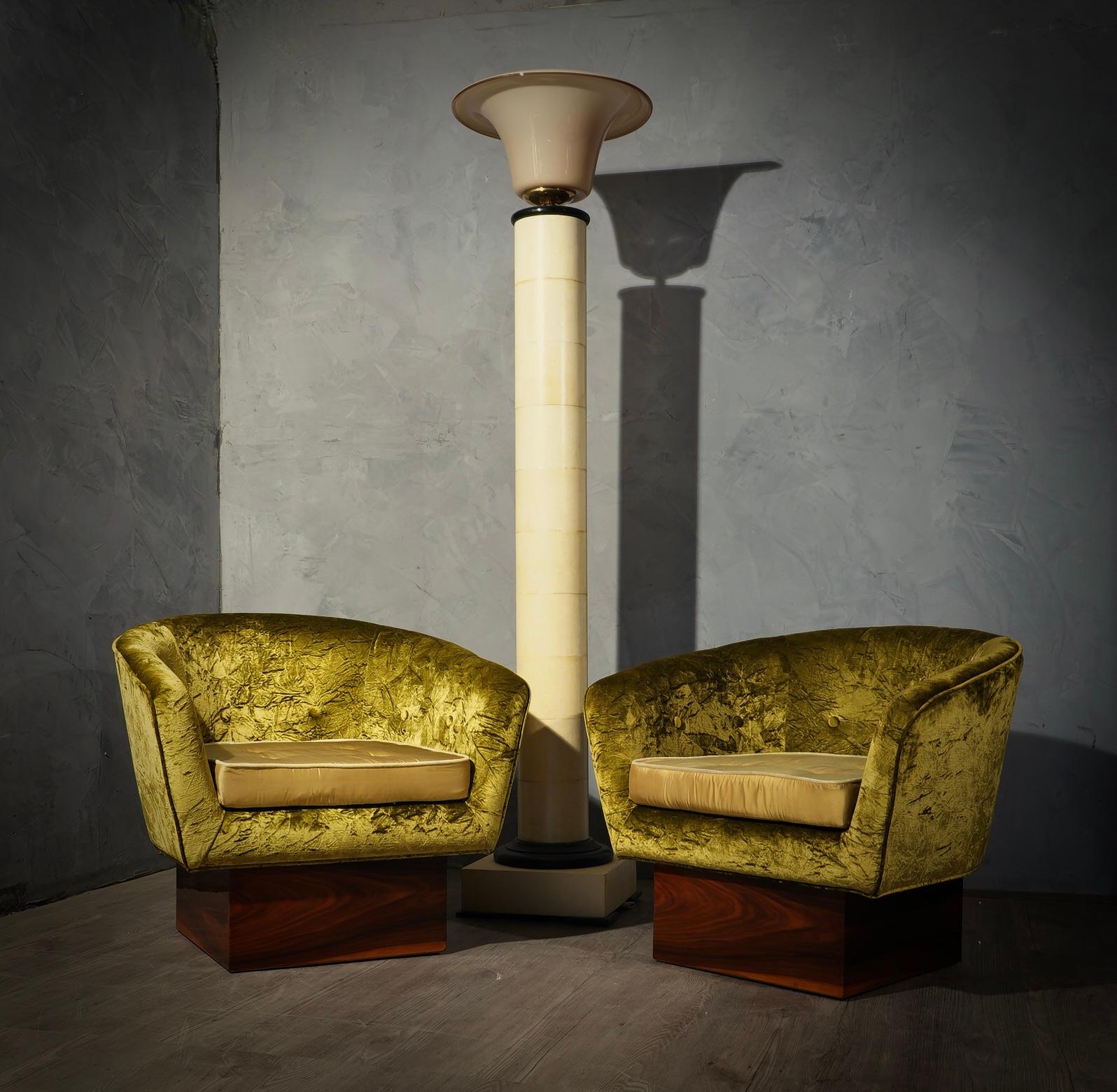 Beautiful coupled with pastel green velvet and a central walnut pedestal, for this very special Art Deco armchairs.

Armchair with base veneered of walnut wood, and seat covered in two types of velvet. The armchair is well structured in design, and