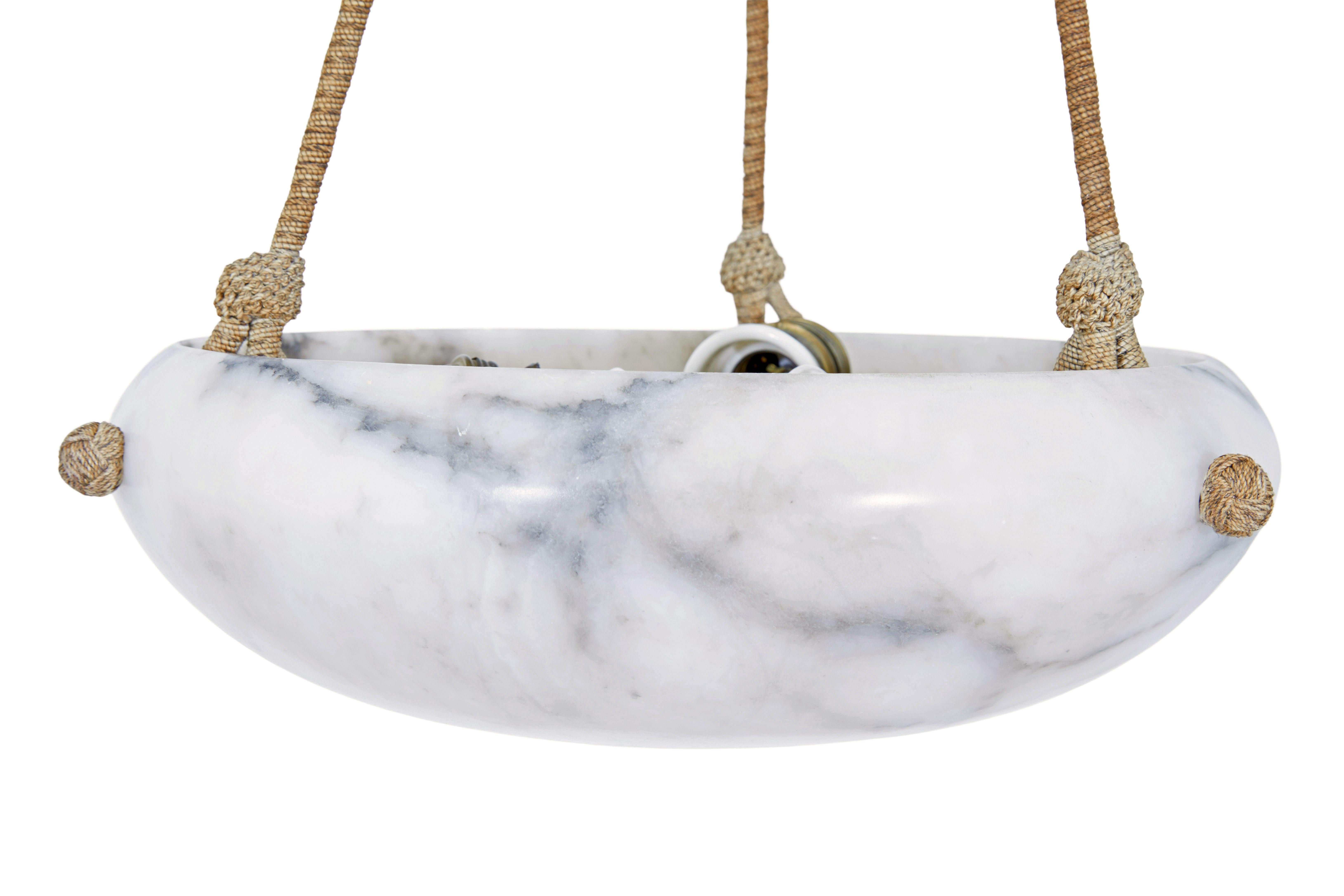 Art Deco grey and white alabaster pendant light circa 1930.

Fine quality circular hanging pendant light. Good sized alabaster dish that lends itself to being used in many rooms around the home.

Grey/white colour with darker grey veining. Light