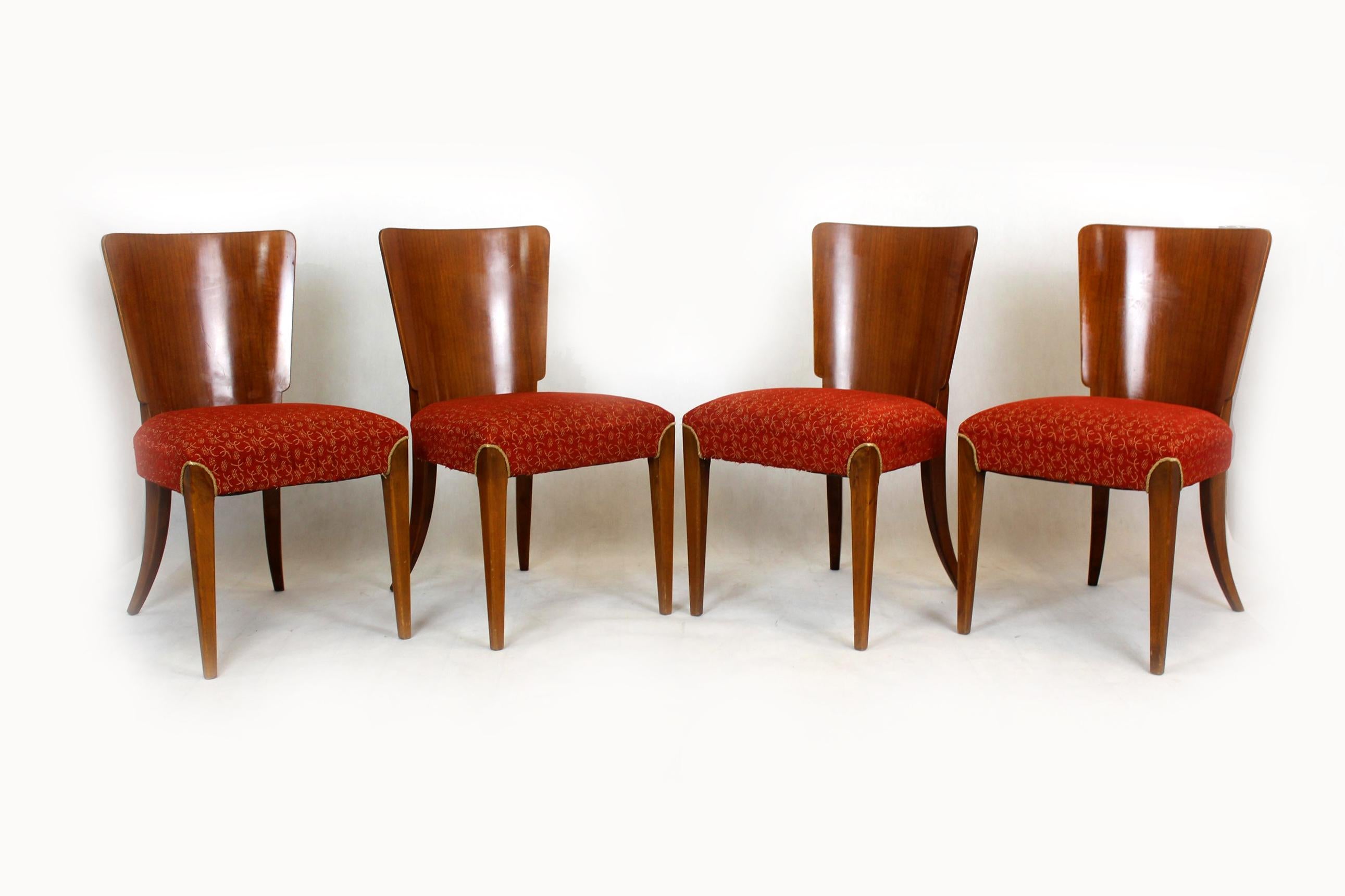 Set of four walnut dining chairs, mod. H-214, designed by Jindrich Halabala for Up Zavody. Manufactured in the 1950s in Czechoslovakia.