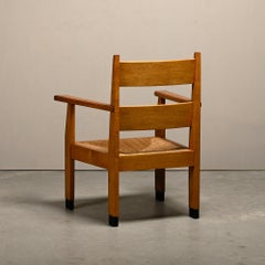 Dutch Art Deco The Hague School Armchair in solid Oak and Straw, 1930s