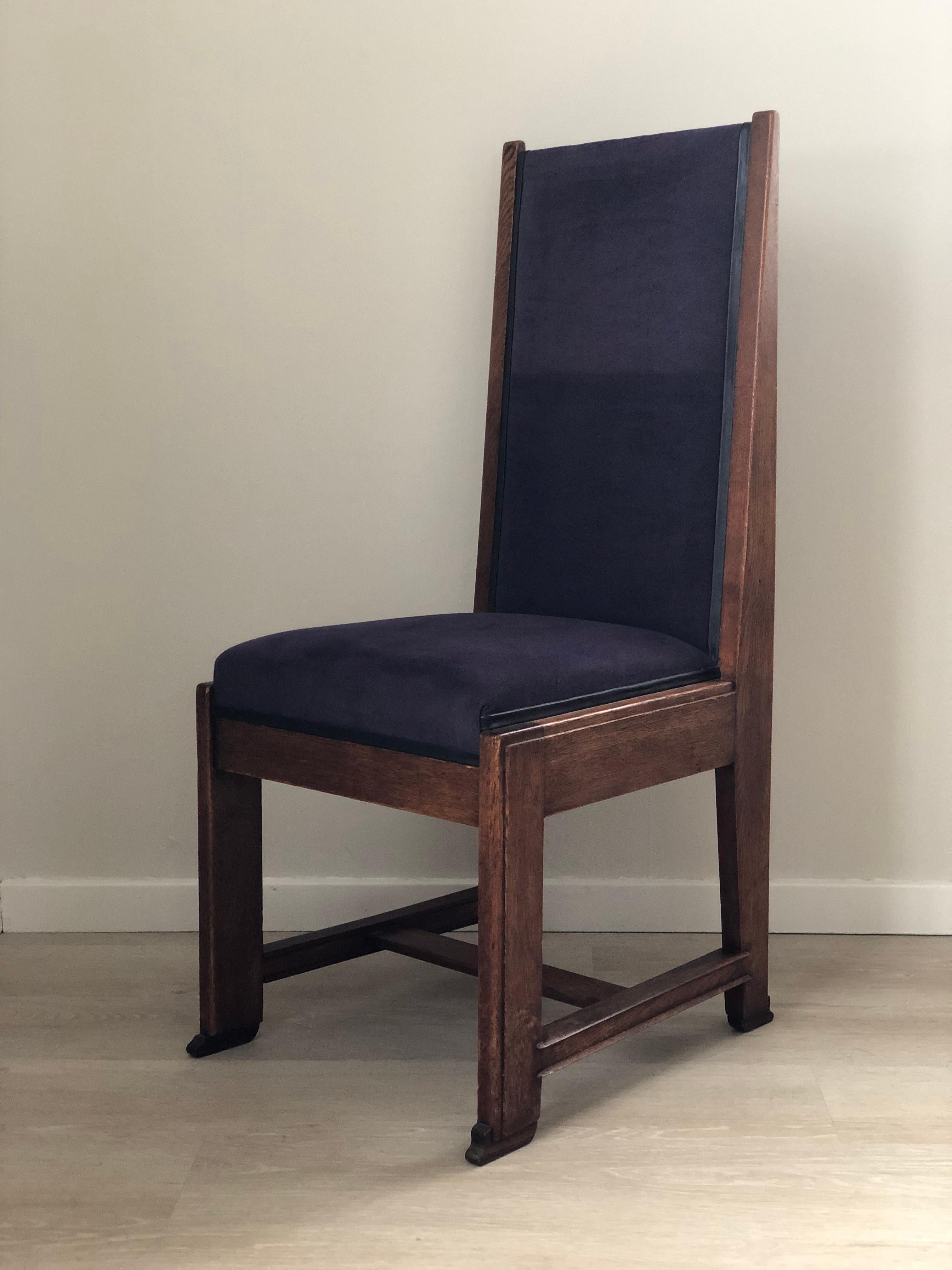 Art Deco design dining chairs from The Netherlands. Frits Spanjaard for 'The Hague School' 1930s. The 4 high-quality chairs with a high back have beautiful features, have been carved and re-waxed. The purple fabric of the seat and back is from a