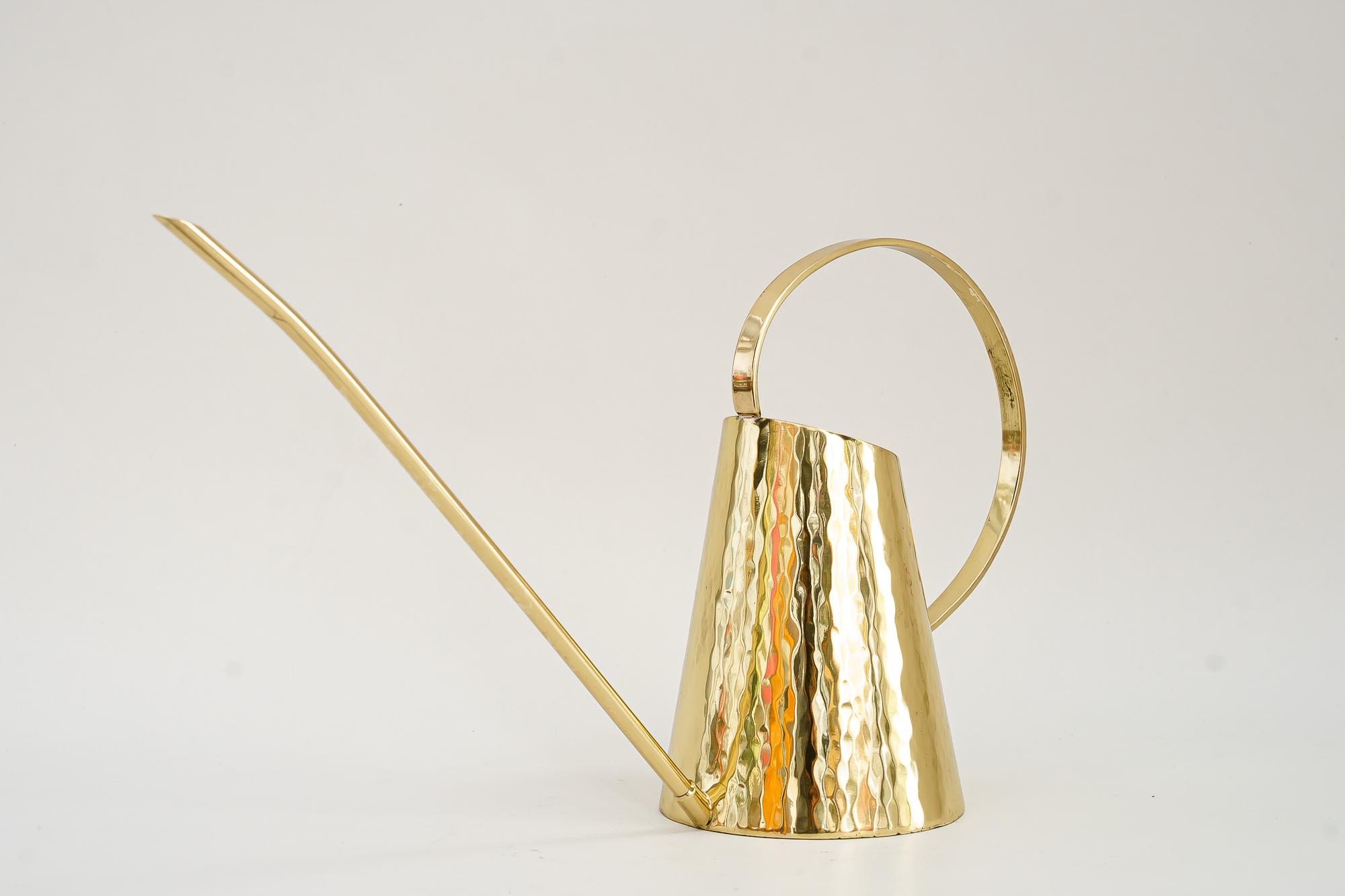 Art Deco hammered watering can, circa 1920s
Polished and stove enameled.