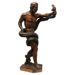 Art Deco Hand-Carved Wood Sculpture of Man with Serpent, Circa 1920s