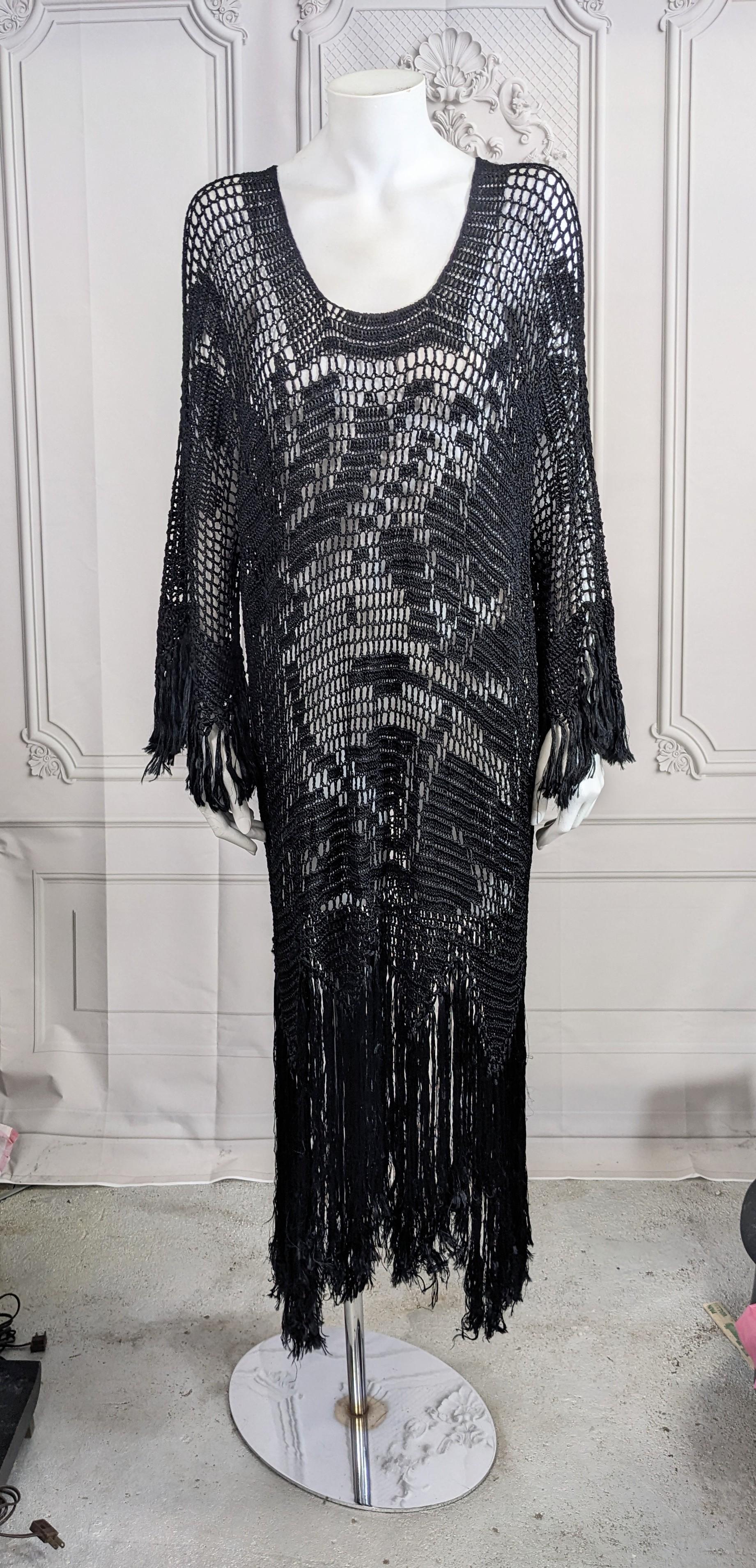 Amazing Art Deco Hand Crochet Fringed Dress with Bohemian vibes. Had made circa 1920's in black as an overdress abstract openwork floral pattern and fringed trim. Hand made. 1920's. Rayon.