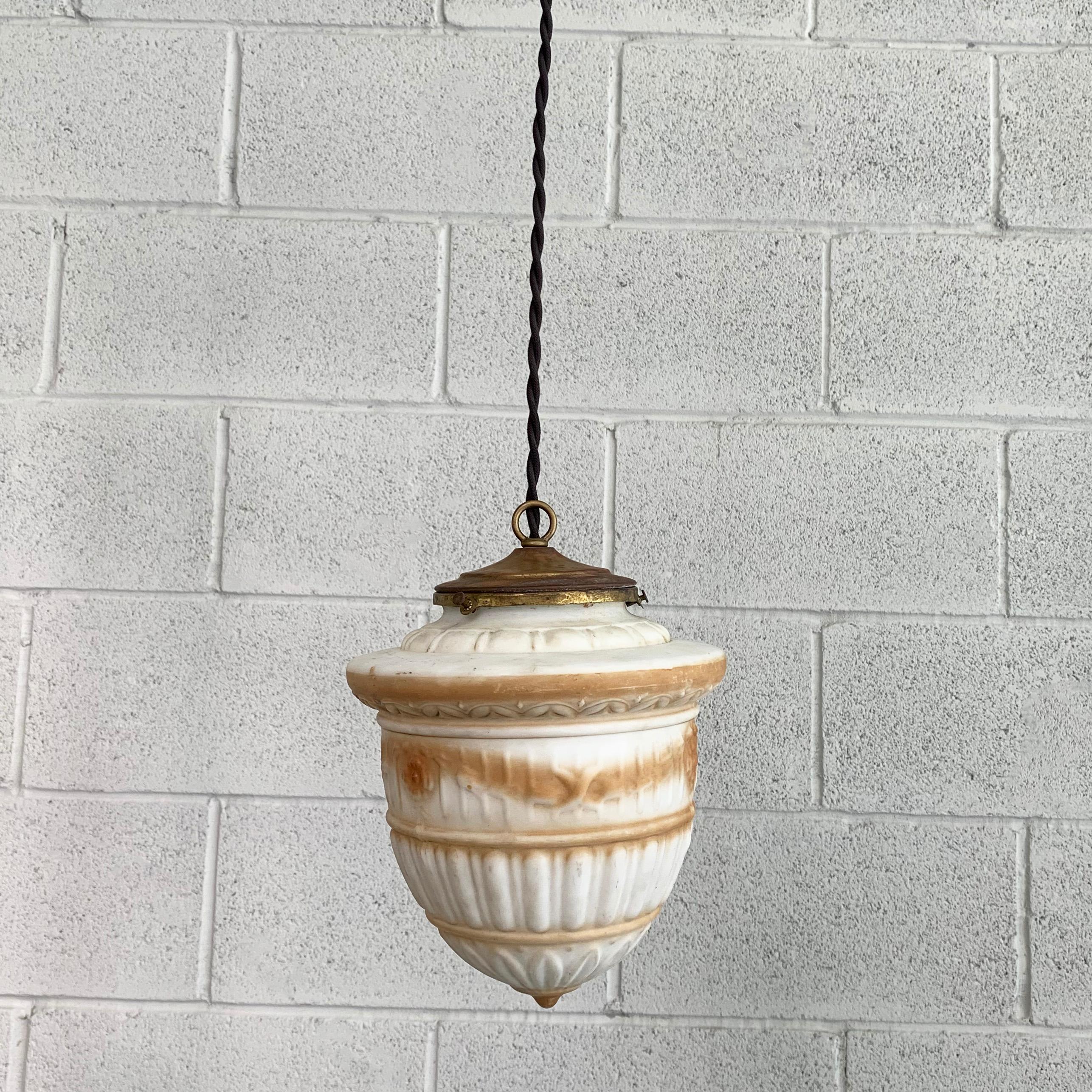 Art Deco pendant light featuring a hand-decorated, airbrushed glass shade with brass fitter is newly wired with 40 inches of braided cloth cord to accept up to a 100 watt bulb.