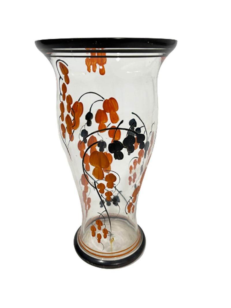 Art Deco hand-painted enamel-paint vase by Anthonius Johannes van Kooten (1894-1951)

A Dutch artist. He worked for a short time at the glass factory Leerdam, but started his own company 